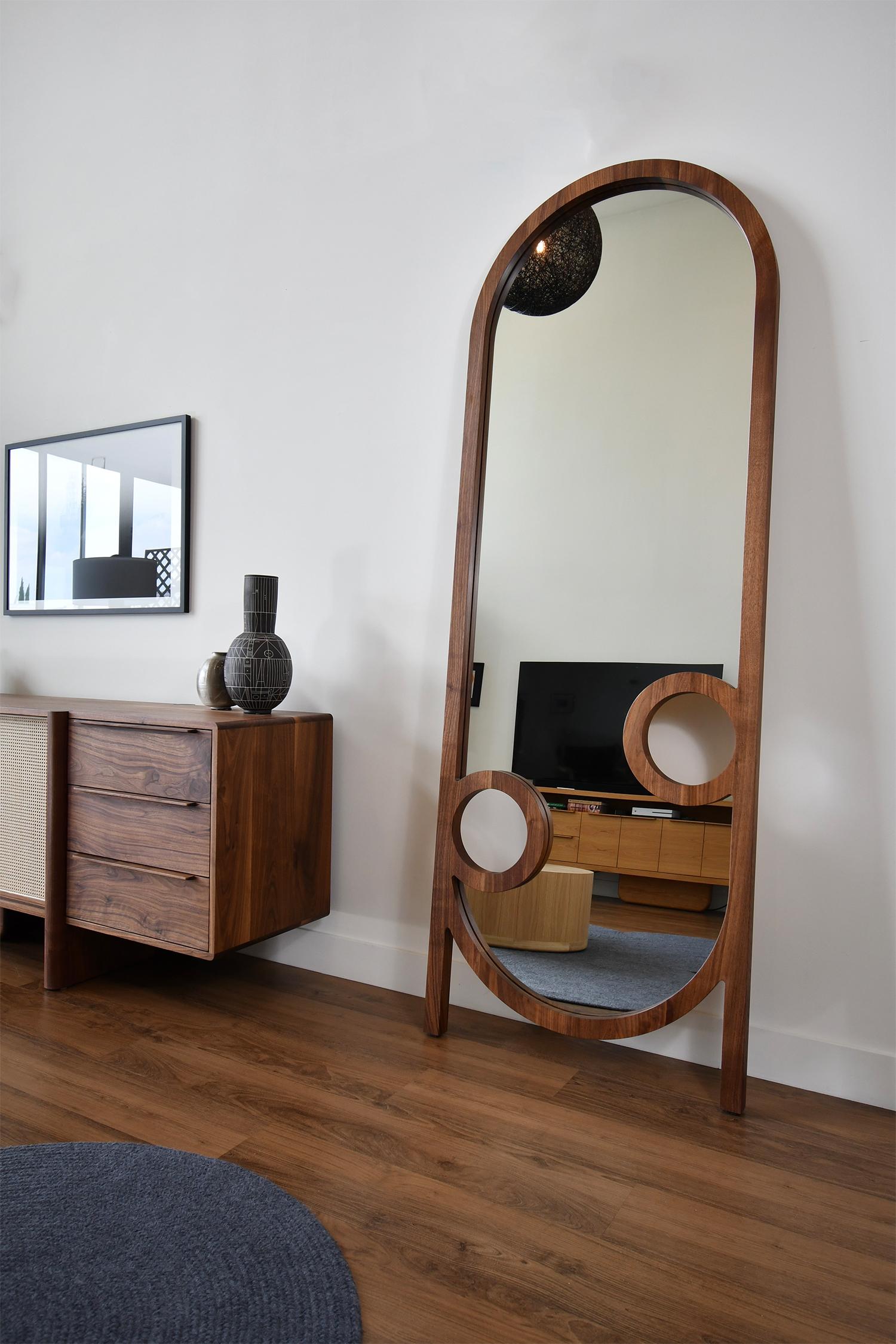 The Silas floor mirror takes the classic arch form and creates a strong visual statement with the rounded shapes anchored to the floor by its base. With its ability to lean against the wall, this simple shape with sophisticated details will provide