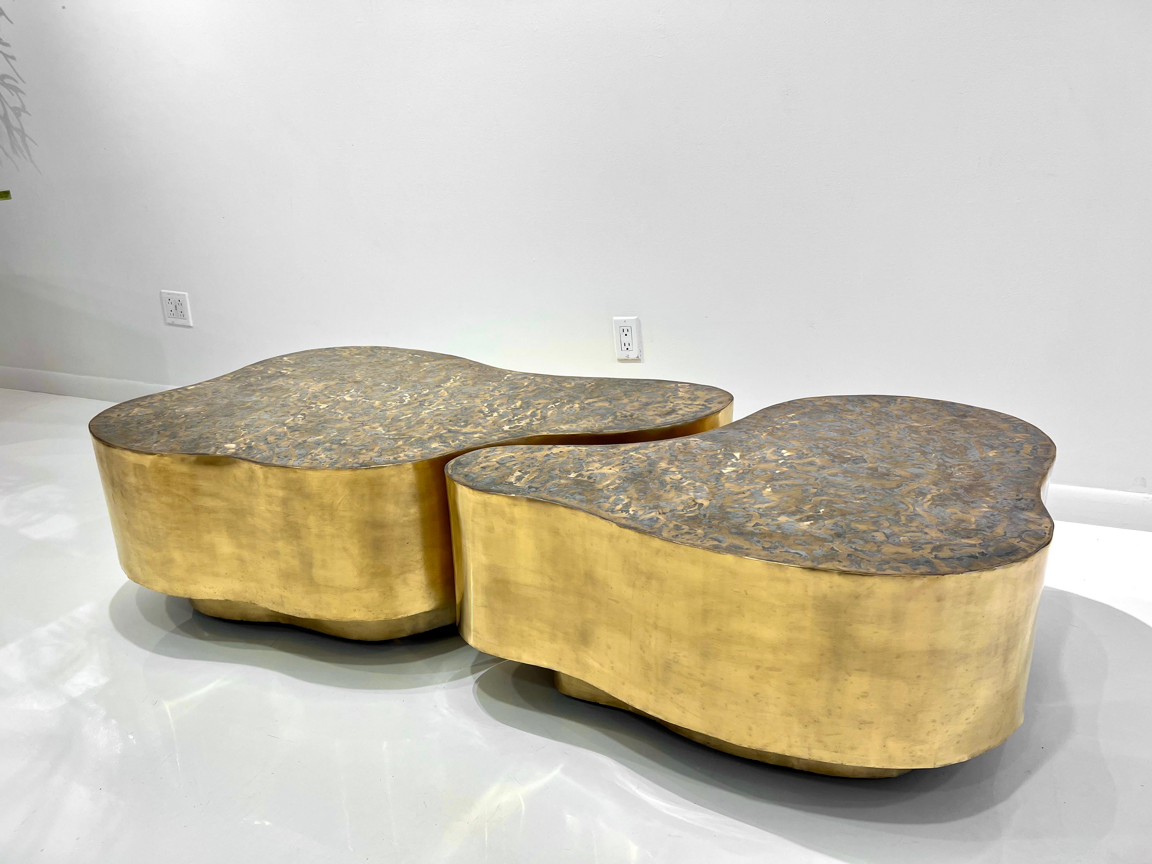 Pair of rare 1960's Bronze Biomorphic Coffee Tables by Silas Seandel, patinated with brushed textured top.
Two part coffee table. Each part is on hidden casters and can be moved and separated with ease. Signed on the top edge of the smaller