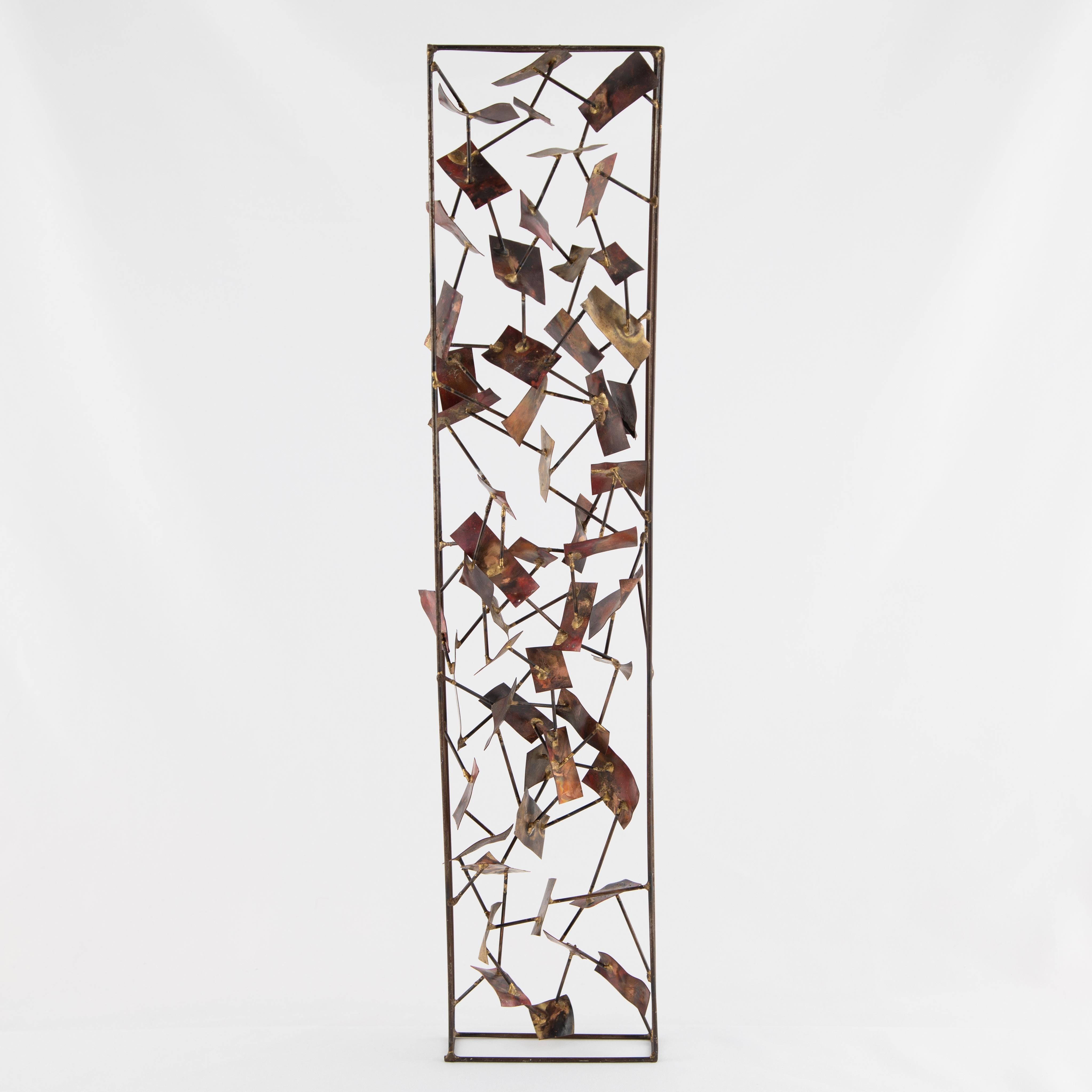 A series of undulating copper rectangles Cascade like confetti in this tabletop sculpture by New York artist Silas Seandel. The panels are connected to one another and the rectangular frame with brass brazing and steel rods. A lovely piece with a
