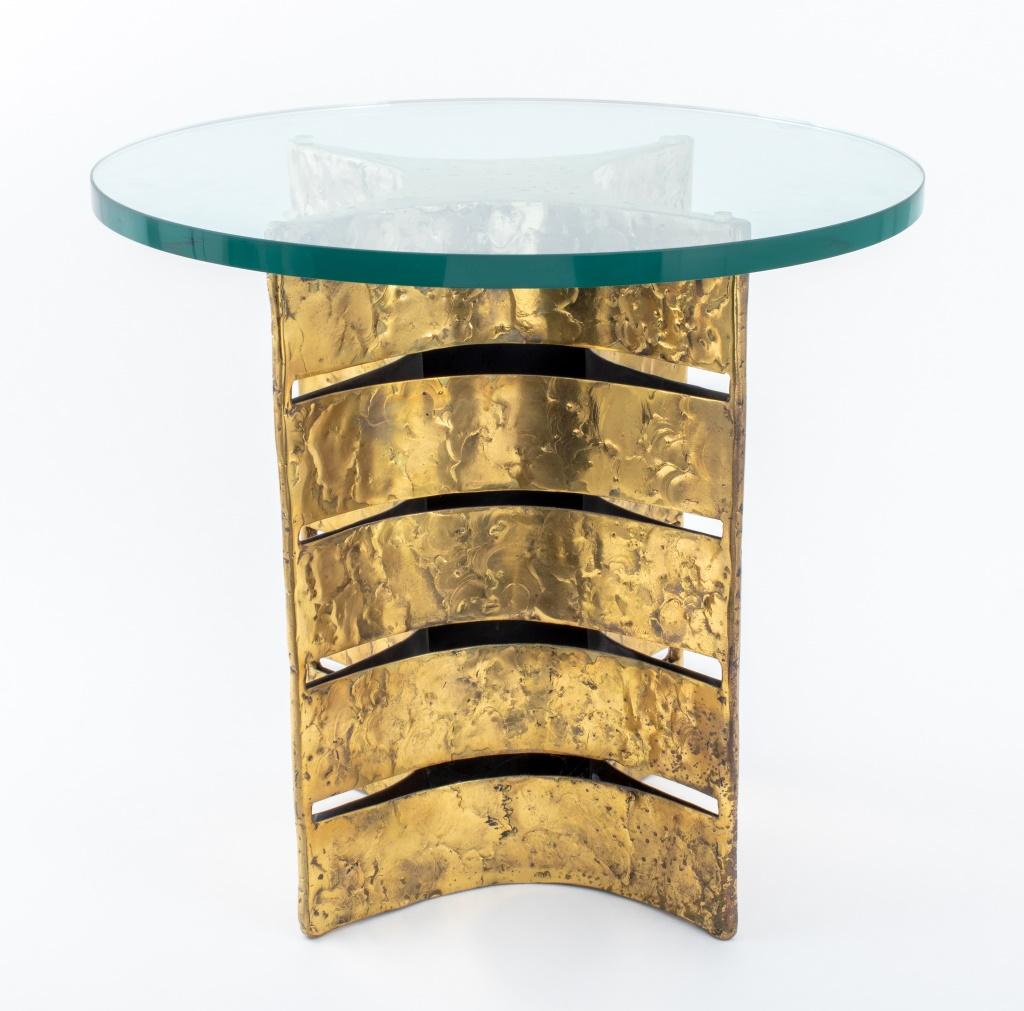 Silas Seandel (American, b. 1937) Brutalist gilt bronze side or accent table with glass top, the sculptural base with geometric four pointed star design, unmarked, together with receipt from Silas Seandel Studio, Inc. dated 12 March 2001. 18.25