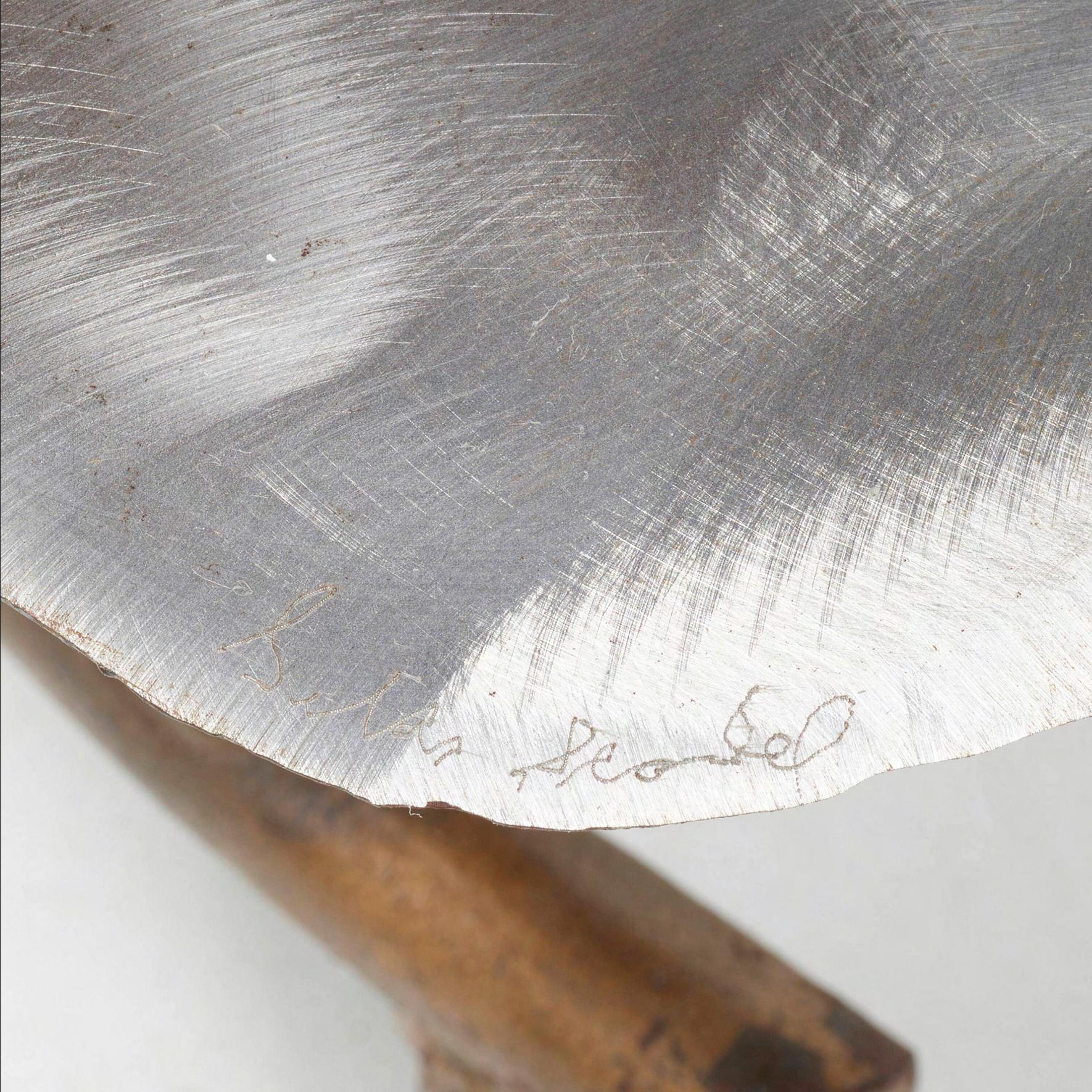 Torch cut mixed metal Lily Pads coffee table with glass top included. Etched signature to base ‘Silas Seandel’. 