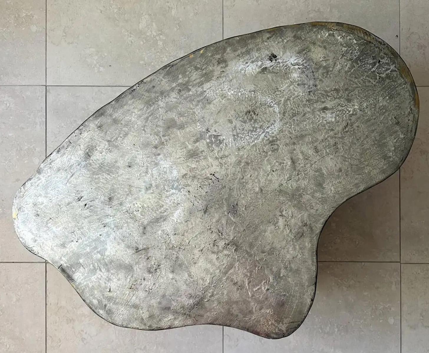 Silas Seandel, American (Born 1937). Mid-Century modern sculptured free form patinated welded bronze coffee table with silvered top. Partial signature on side is slightly worn from age and use. Measures 16