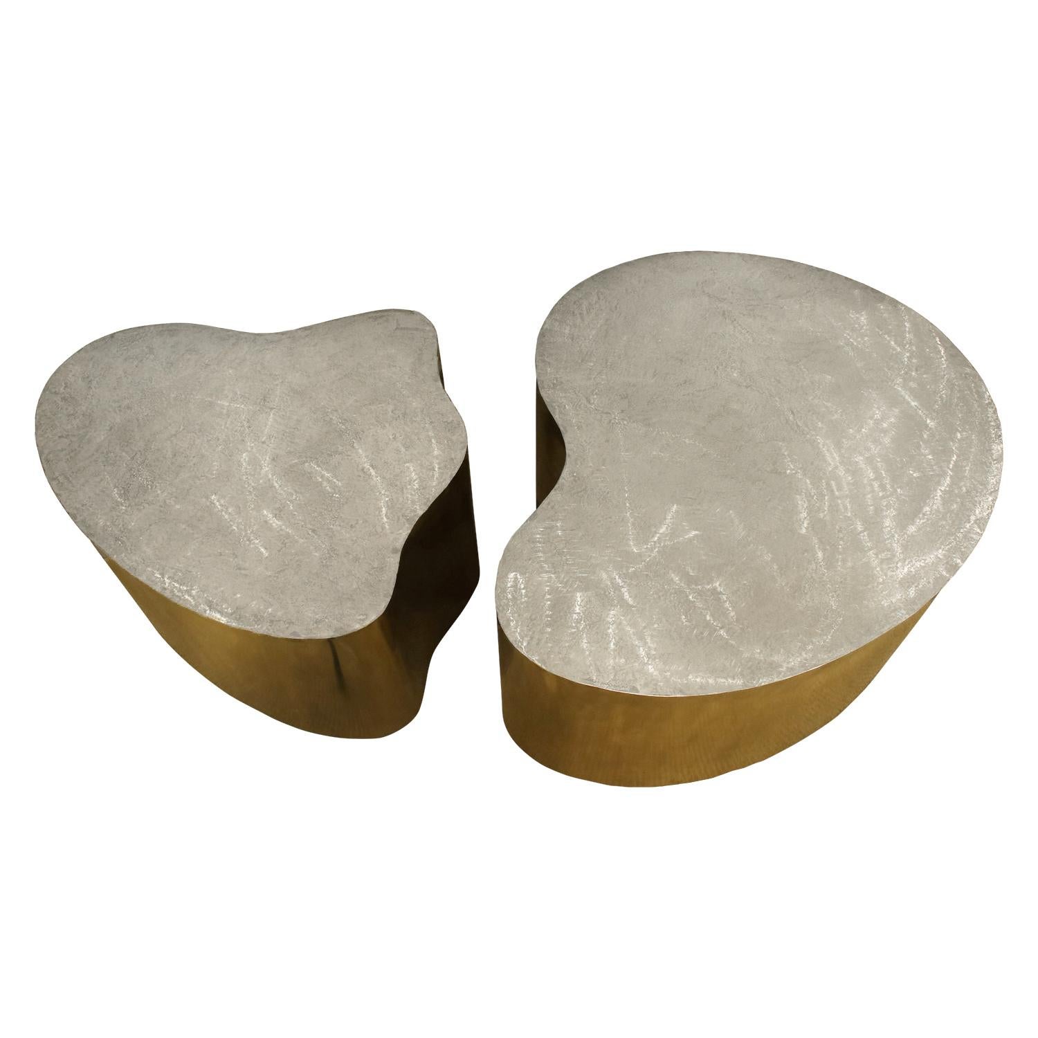 Pair of organic free form coffee tables, bases in patinated brass with tops in brushed steel on hidden castors by Silas Seandel, American 1980s (signed on top “Silas Seandel”). These tables are super chic and the combination of metals is beautiful. 