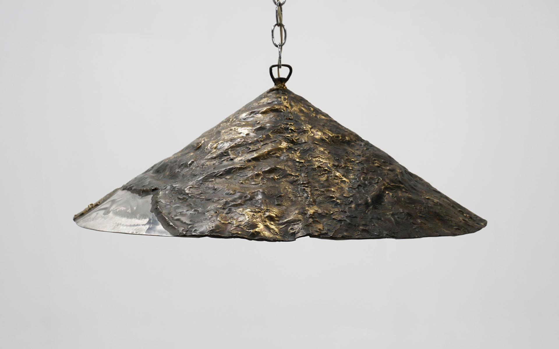 Signed Silas Seandel pendant light fixture or swag lamp, 1974, New York, New York. Brutalist form in solid brass and aluminum. This is a unique one of a kind piece. Signature is etched into the brass.