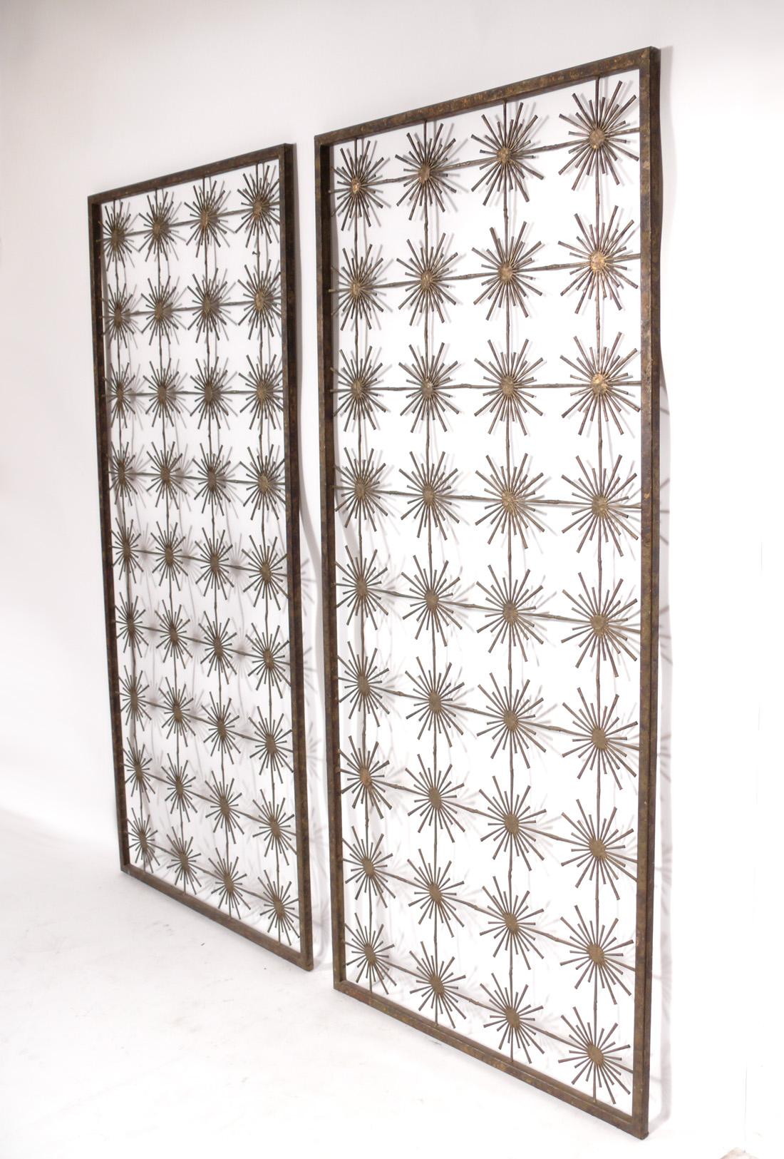 Pair of unique sculptural screens or room dividers, hand made by Silas Seandel, American, circa 1960s. They retain their warm original patina. These came from a Long Island, NY home where Seandel completed several custom pieces. These were