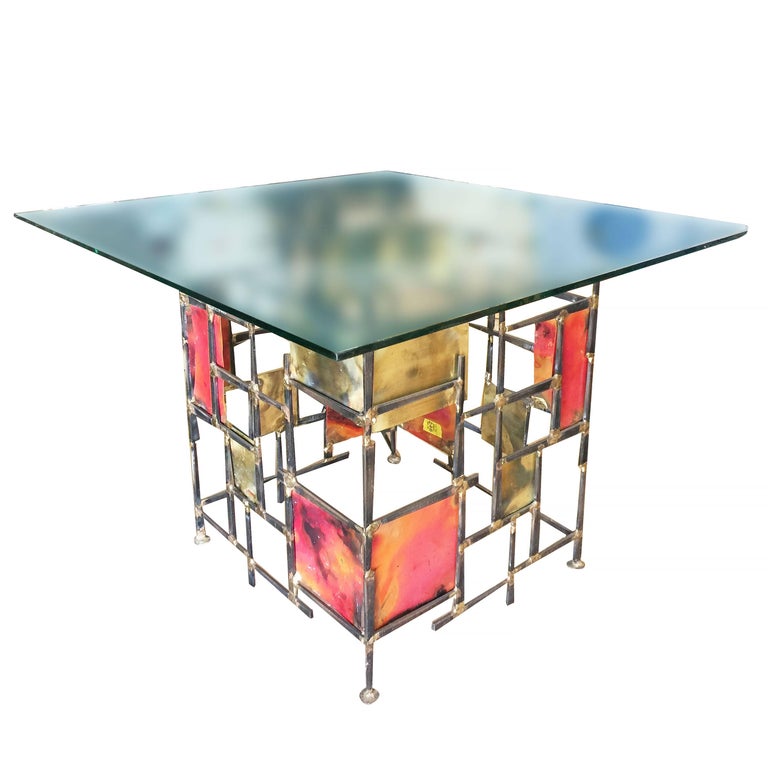 Silas Seandel style Brutalist mixed metal nail side table with glass top. 

The table features a sculptural base made with welded nails and enameled flame cut steel piece complete with glass top.