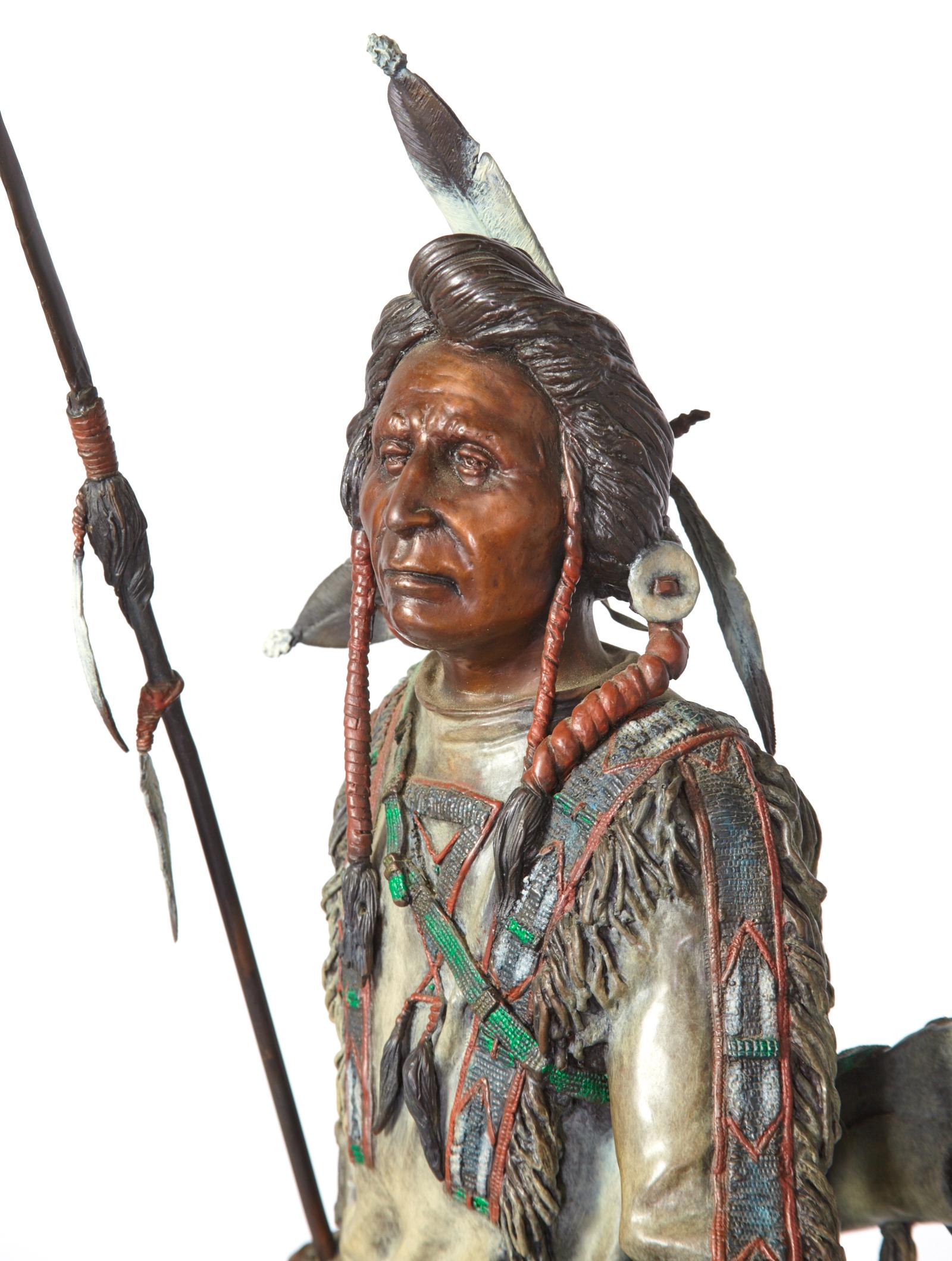 'Silent Sentinel' circa 1996 is a painted bronze figure by James Regimbal depicting a strong and self assured Indian warrior. This powerful piece is in excellent condition and stands 30
