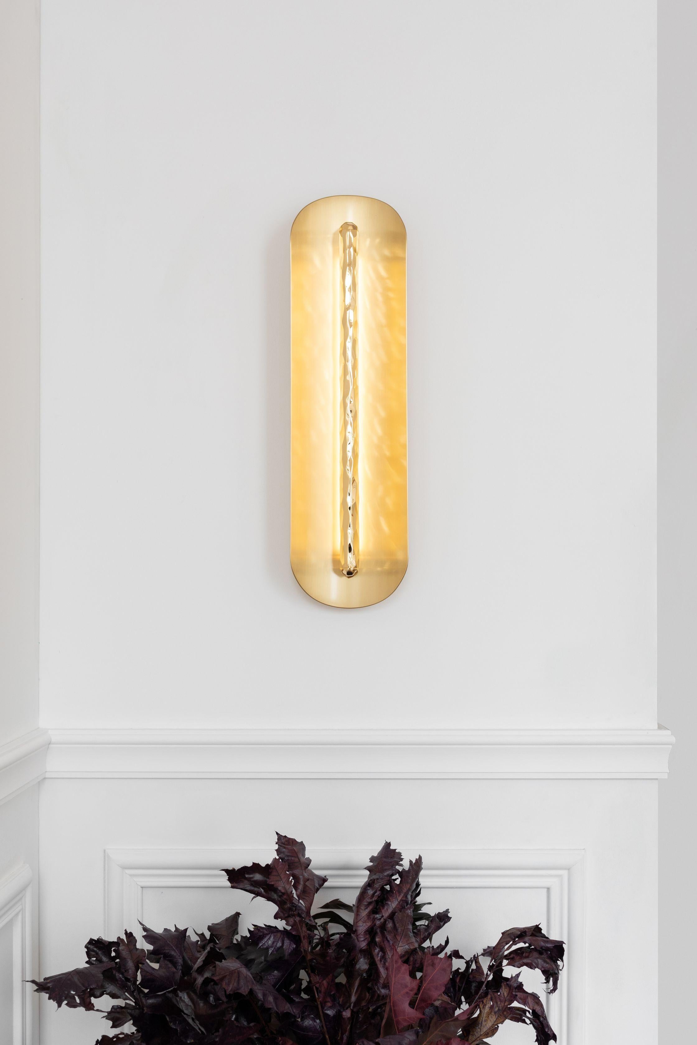Silex wall lamp by Mydriaz
Dimensions: W 14.5 x H 60 x D 14 cm
Materials: Brass
Finishes: Golden-plated, polished brass, white nickel finish, on polished brass, black nickel finish on
 polished brass

All our lamps can be wired according to