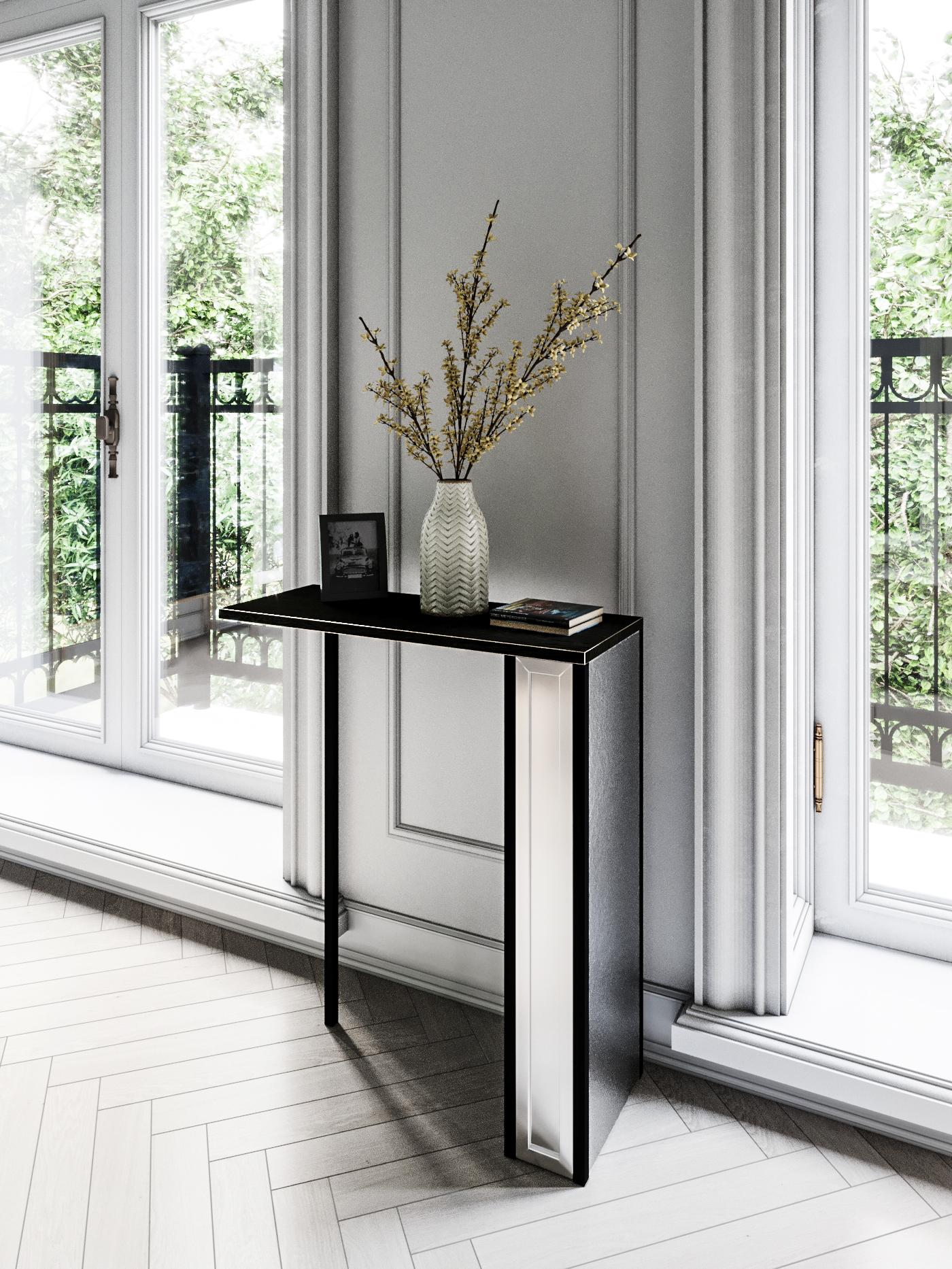 The silhouette console is designed by Emél & Browne in the minimalist and contemporary style and custom made in Italy by skilled artisans.

The delicate vertical elements of the silhouette console table resemble slender figures on the horizon