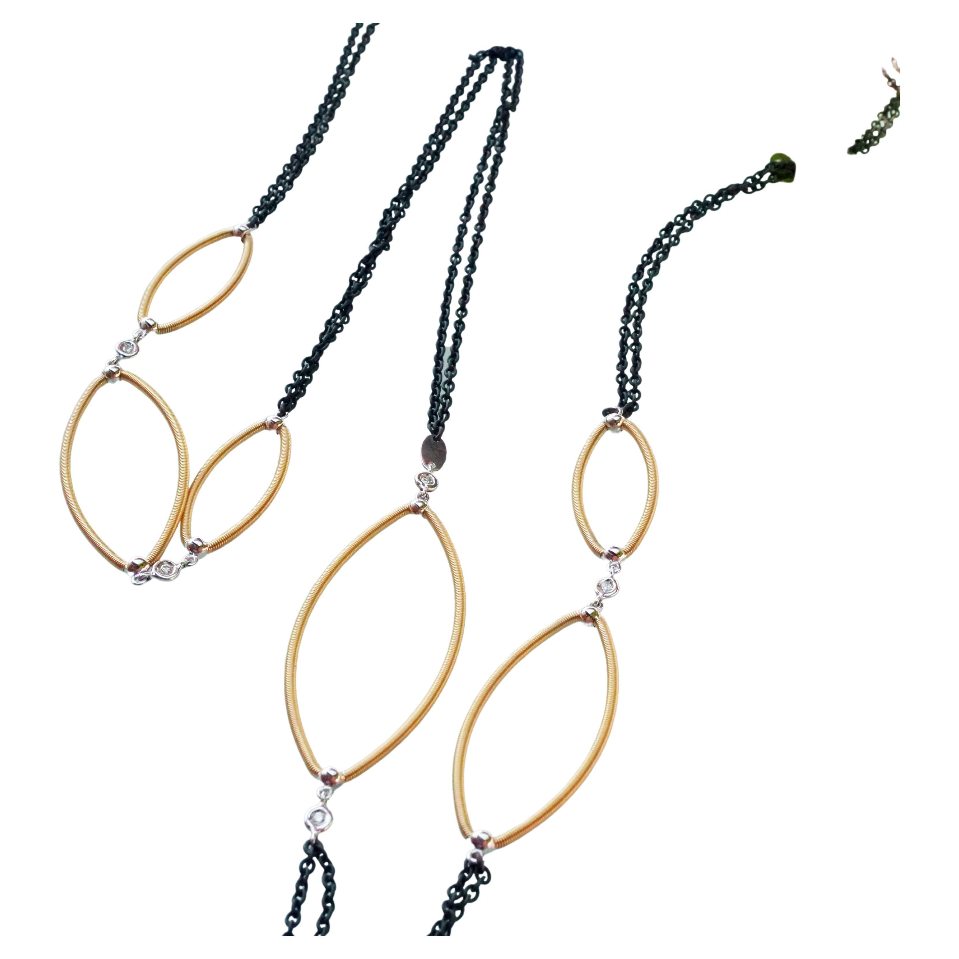 Präzion paired with craftsmanship, this beautiful necklace was designed by the fine gold wire wrapping around a flexible titanium spring by the company Silhouette Jewelery Bentner from Pforzheim in 750 yellow gold in conjunction with blackened iron,