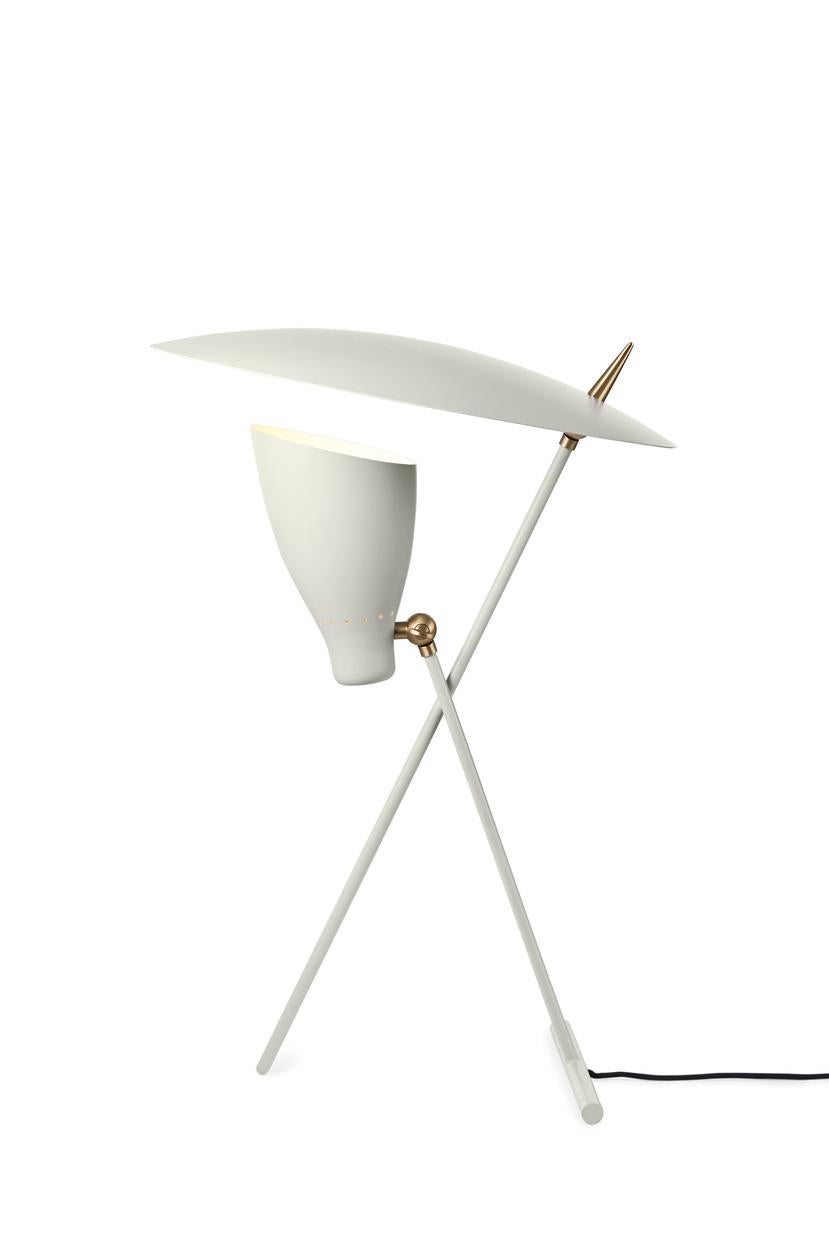 Silhouette warm white table lamp by Warm Nordic
Dimensions: D 40 x W 36 x H 59 cm
Material: Lacquered steel, solid brass
Weight: 2 kg
Also available in different colours. 

A sculptural floor lamp with an asymmetrical idiom, designed in the