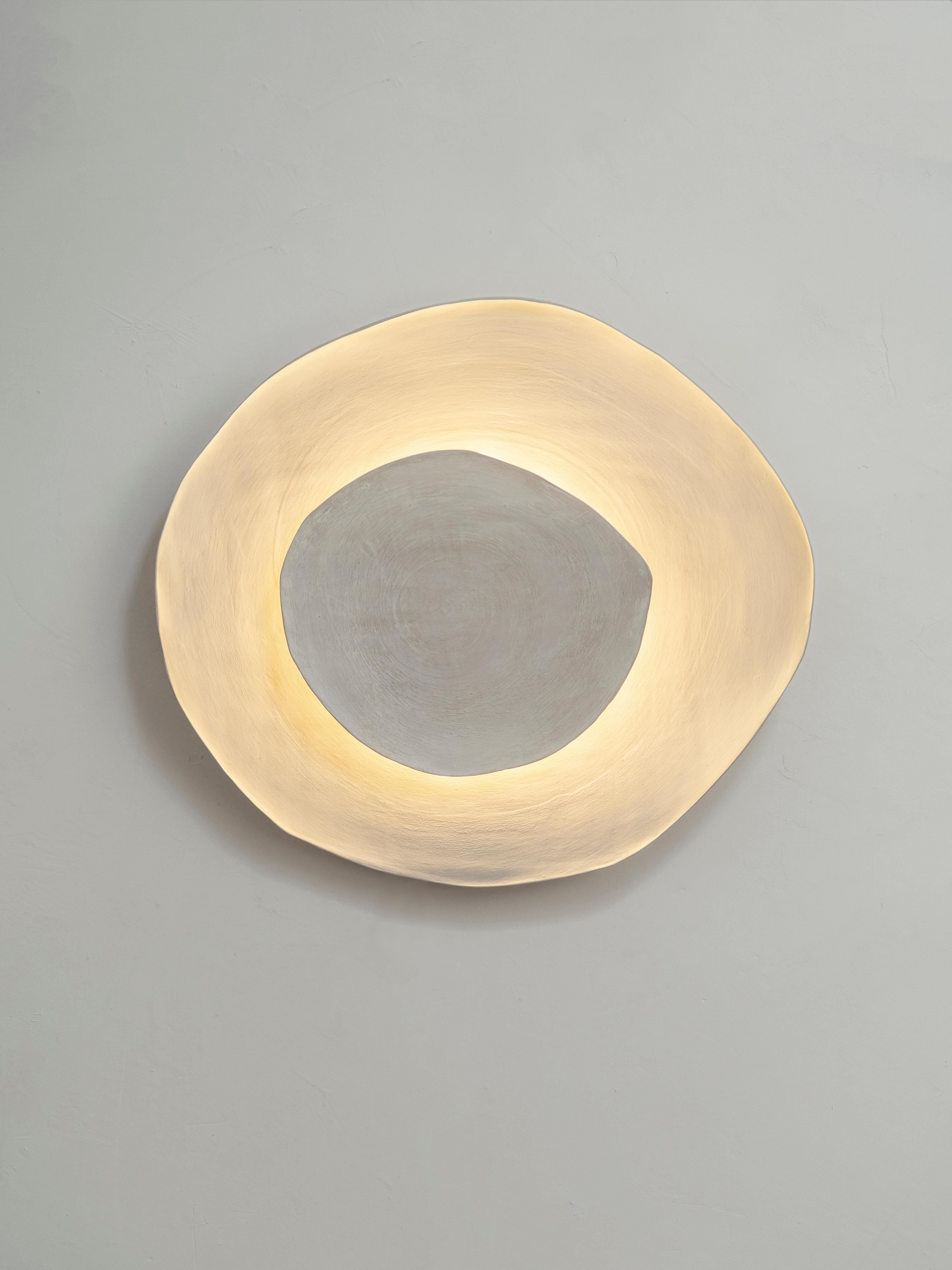 Silk #10 wall light by Margaux Leycuras.
One of a kind, signed and numbered
Dimensions: Ø40 x H 43 cm 
Material: Ceramic, sandy stoneware platters with a porcelain slip finish.
The piece is signed, numbered and delivered with a certificate of
