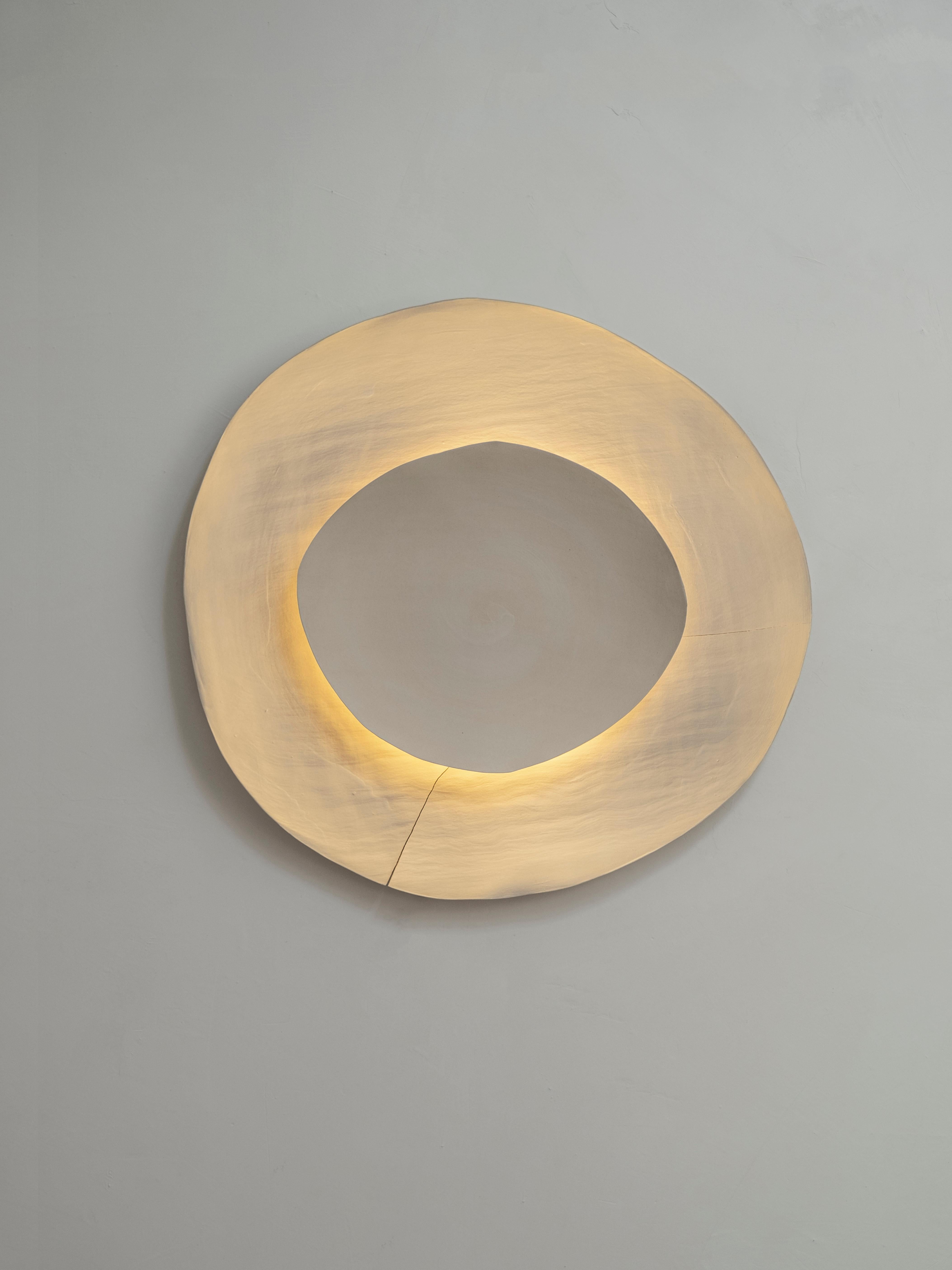 Silk #11 wall light by Margaux Leycuras.
One of a Kind, Signed and numbered.
Dimensions: Ø56 cm.
Material: Ceramic, sandy stoneware platters with a porcelain slip finish.
The piece is signed, numbered and delivered with a certificate of