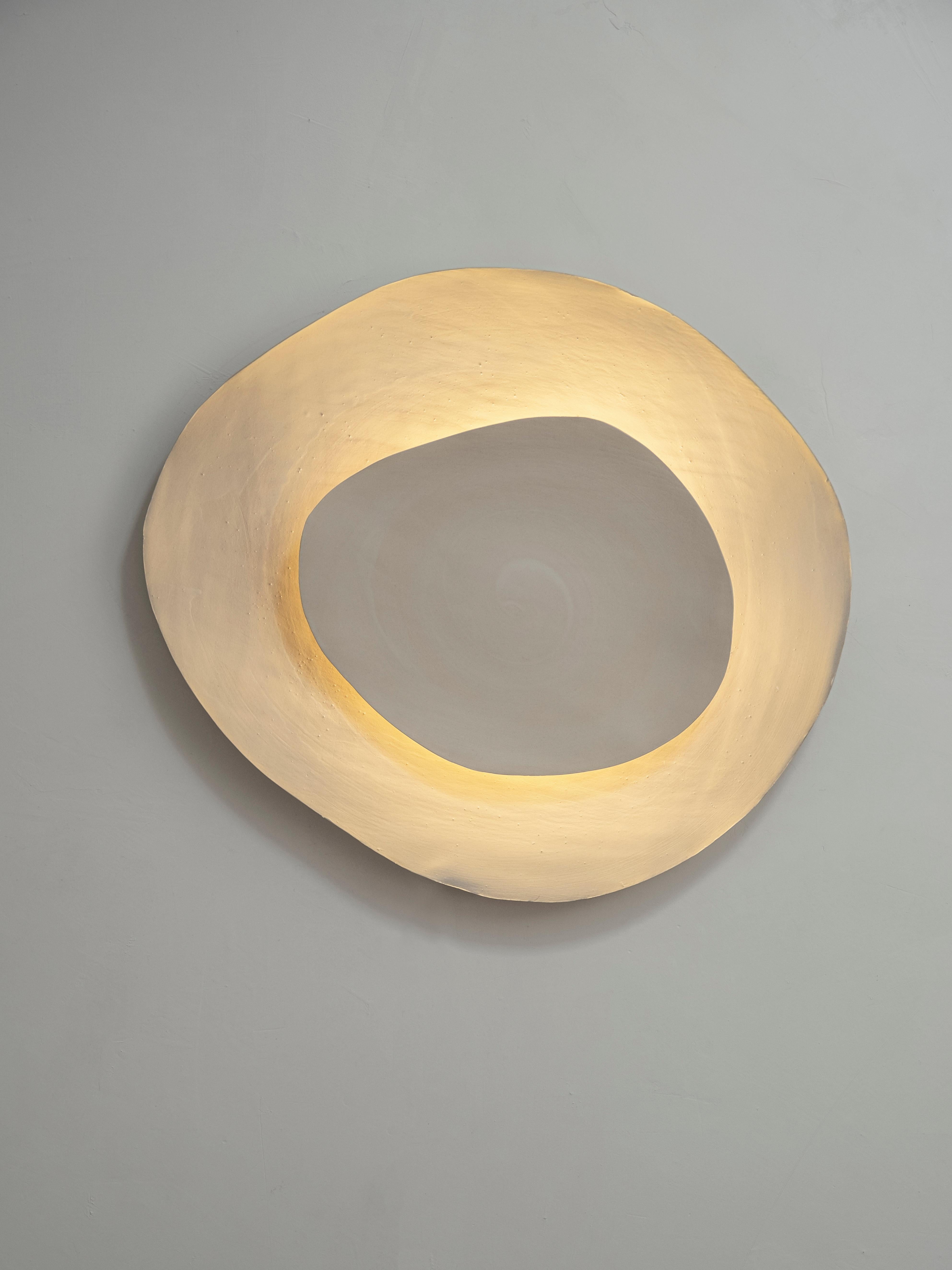 Silk #12 wall light by Margaux Leycuras
One of a Kind, Signed and numbered.
Dimensions: Ø51, H58 cm.
Material: Ceramic, sandy stoneware platters with a porcelain slip finish.
The piece is signed, numbered and delivered with a certificate of