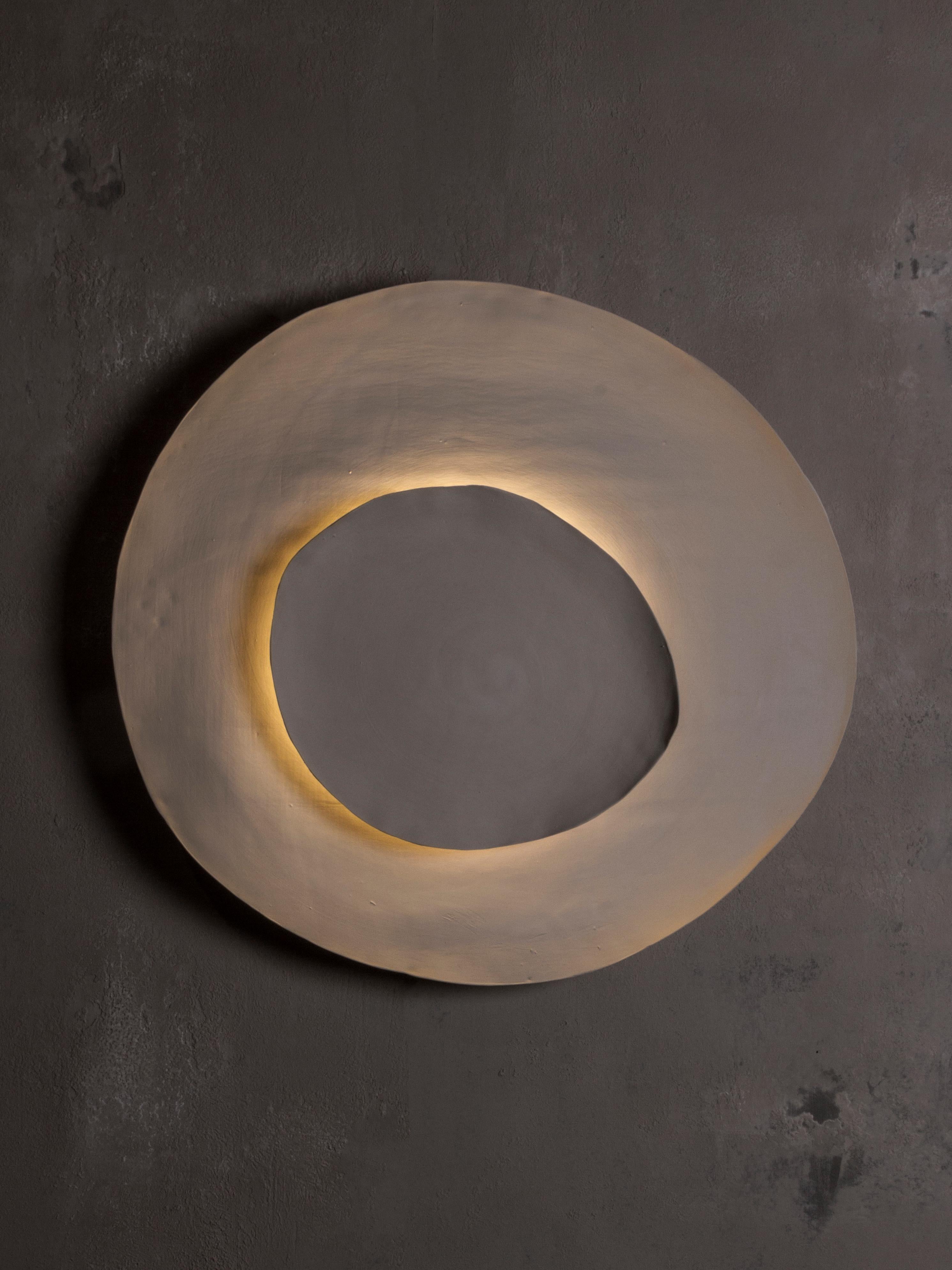 Bone #13 wall light by Margaux Leycuras
One of a Kind, Signed and numbered
Dimensions: D 6 x W 55 x H 50 cm 
Material: Ceramic, sand stoneware tops with a porcelain engobe finish.
The piece is signed, numbered and delivered with a certificate of