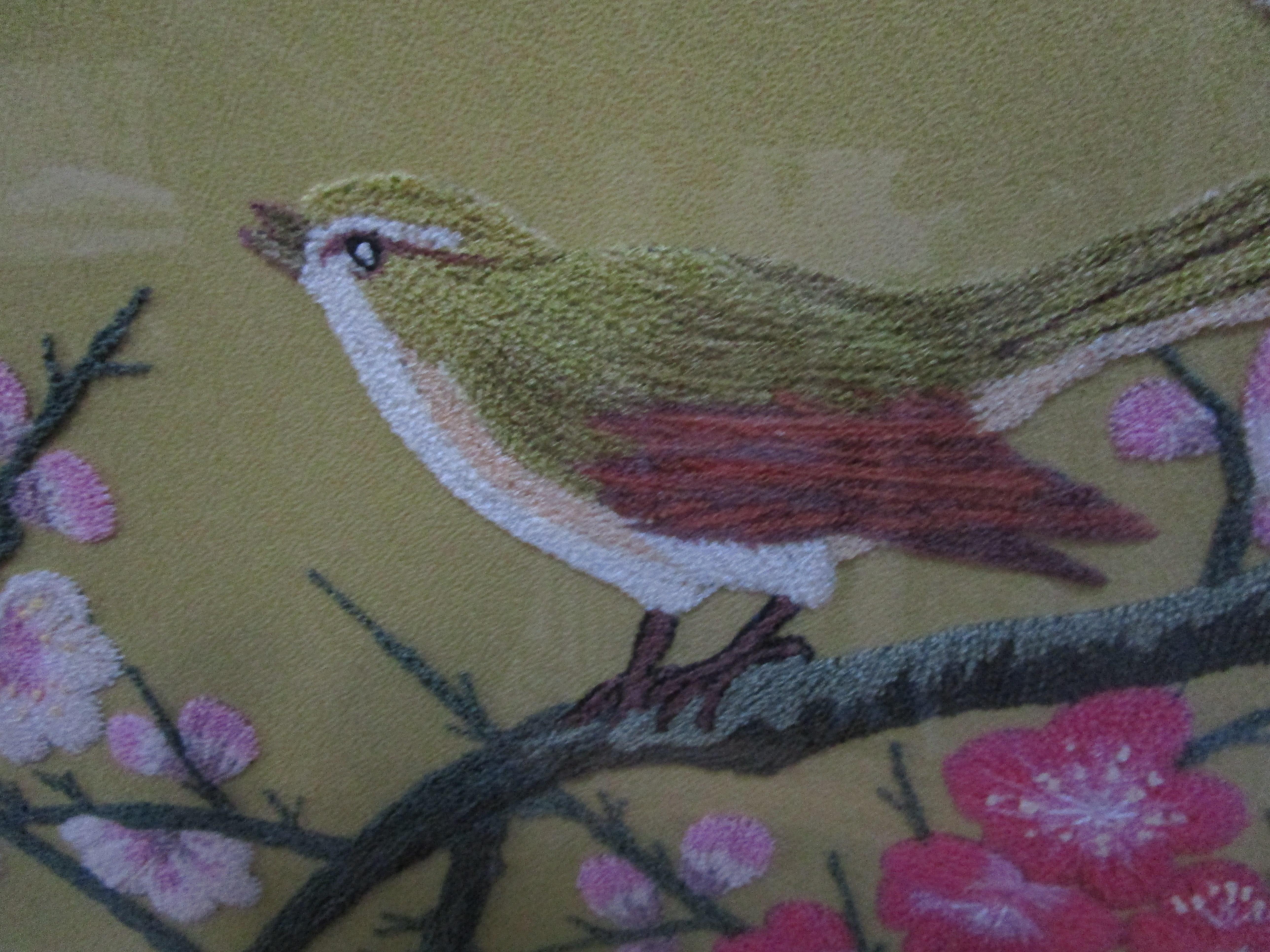 This is a silk Asian needlepoint (Gilt Bamboo-style frame) bird on a branch with flow that measures 38 x 25 x 2.5 inches.It is stunning in pastel colors with a nightingale on a branch amid buds and blooms.
  These techniques encompass a wide range
