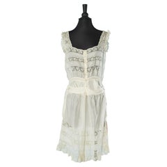 Silk and lace lingerie romper with buttons in the middle front Circa 1900's 