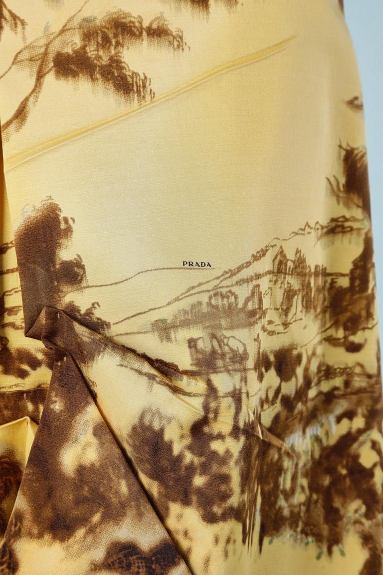 Silk and wool pleated and drape skirt with landscape and temple print.
No lining. 
SIZE 38