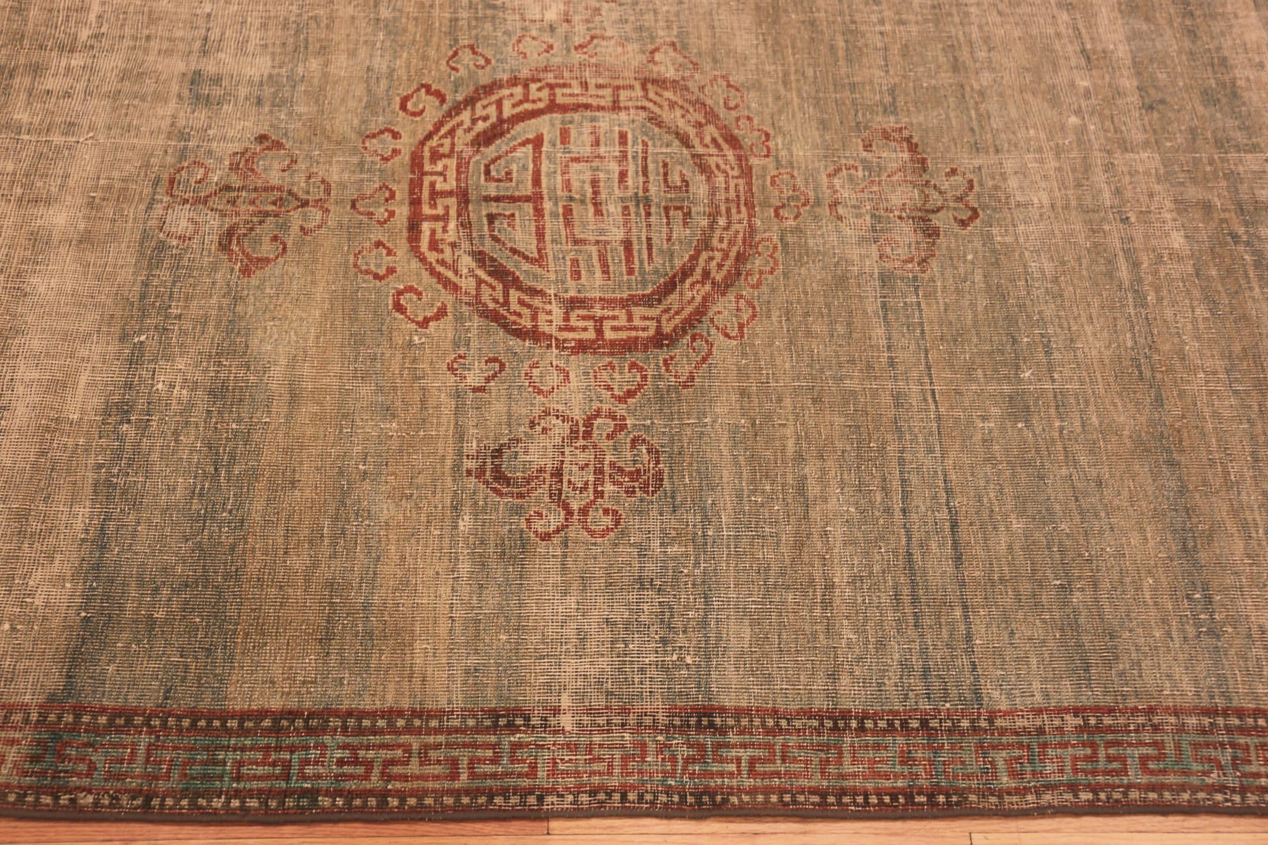 Silk Antique East Turkestan Khotan Rug, Country of Origin / Rug Type: East Turkestan Rugs, Circa date: Early 19th Century. Size: 4 ft 5 in x 9 ft 10 in (1.35 m x 3 m)