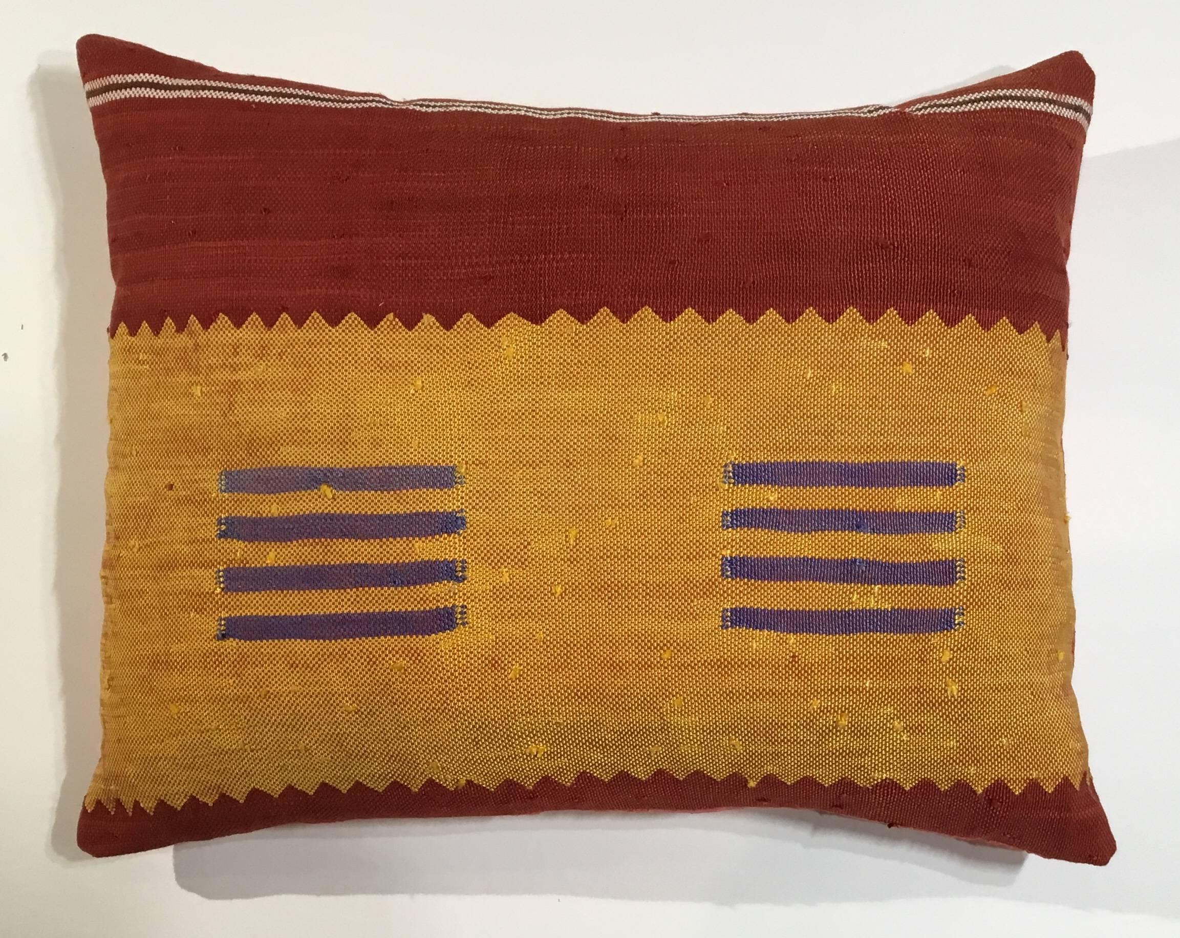 Beautiful pillow made of hand woven flat weave rug fragment, red muster, purple and white color with geometric motif, silk backing, fresh insert.