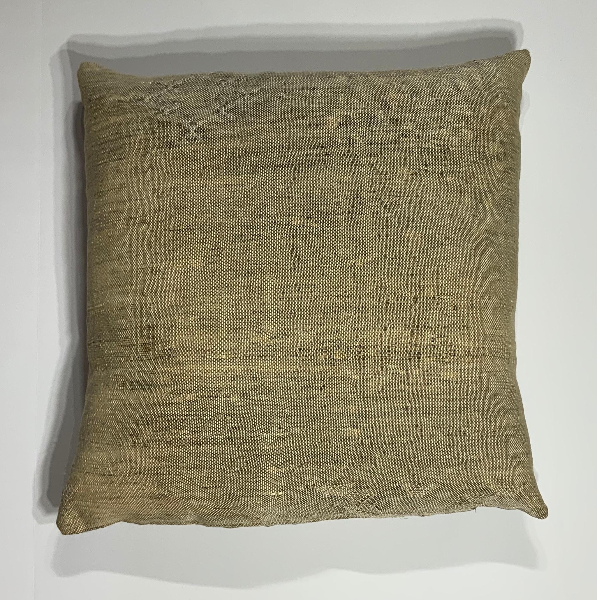 Beautiful pillow made of handwoven flat-weave rug fragment, cream camel color with geometric motif, silk backing, fresh down and feather insert.