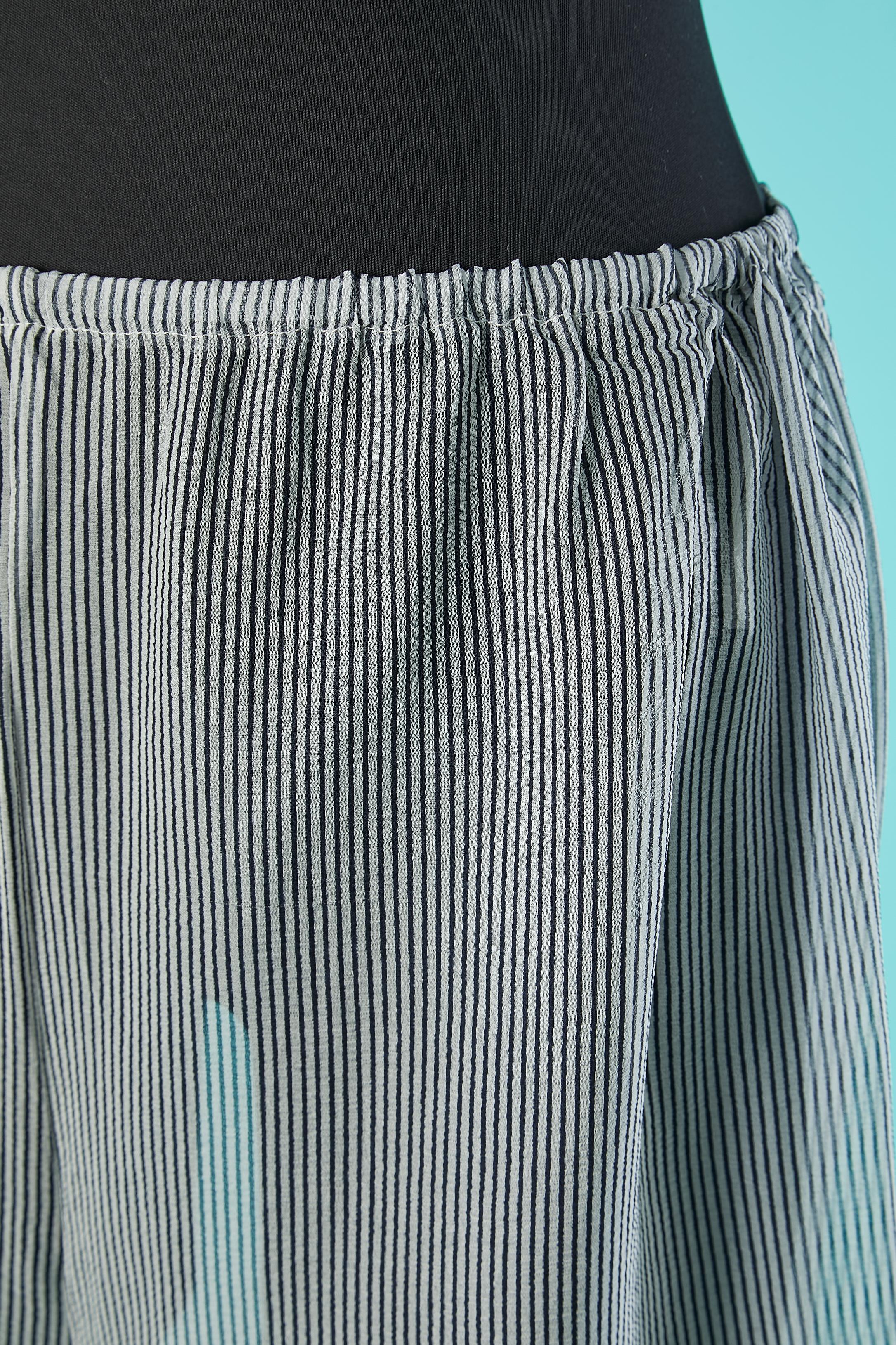 Silk chiffon short with navy blue stripes. Elastic waist. 
SIZE 40 (Fr) 