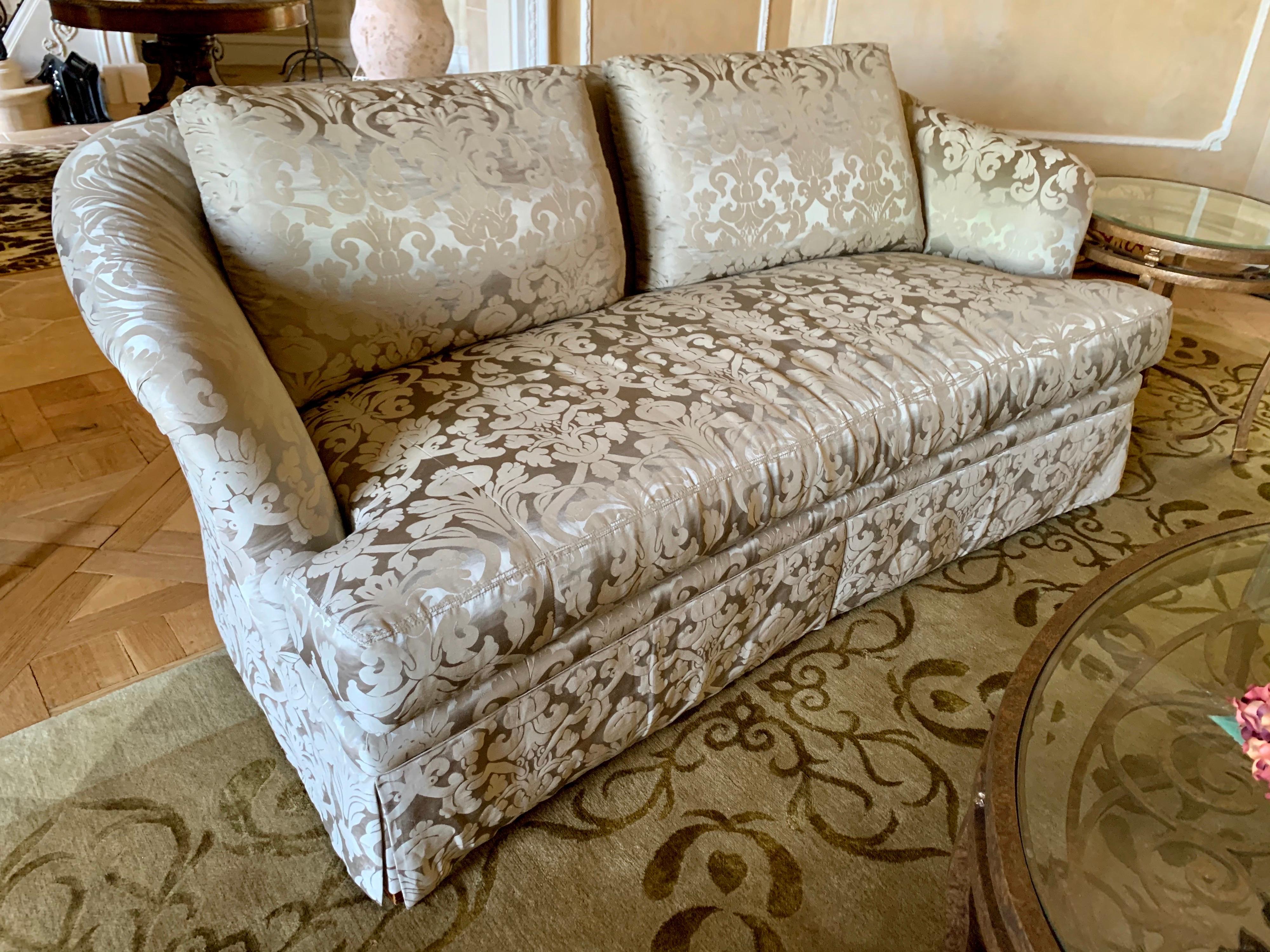 Elegant, mint condition Ferguson Copeland silk damask three seat sofa. The colors are stunning, taupe and a metallic, subtle gold.
Outstanding craftsmanship including eight-way hand tied construction.