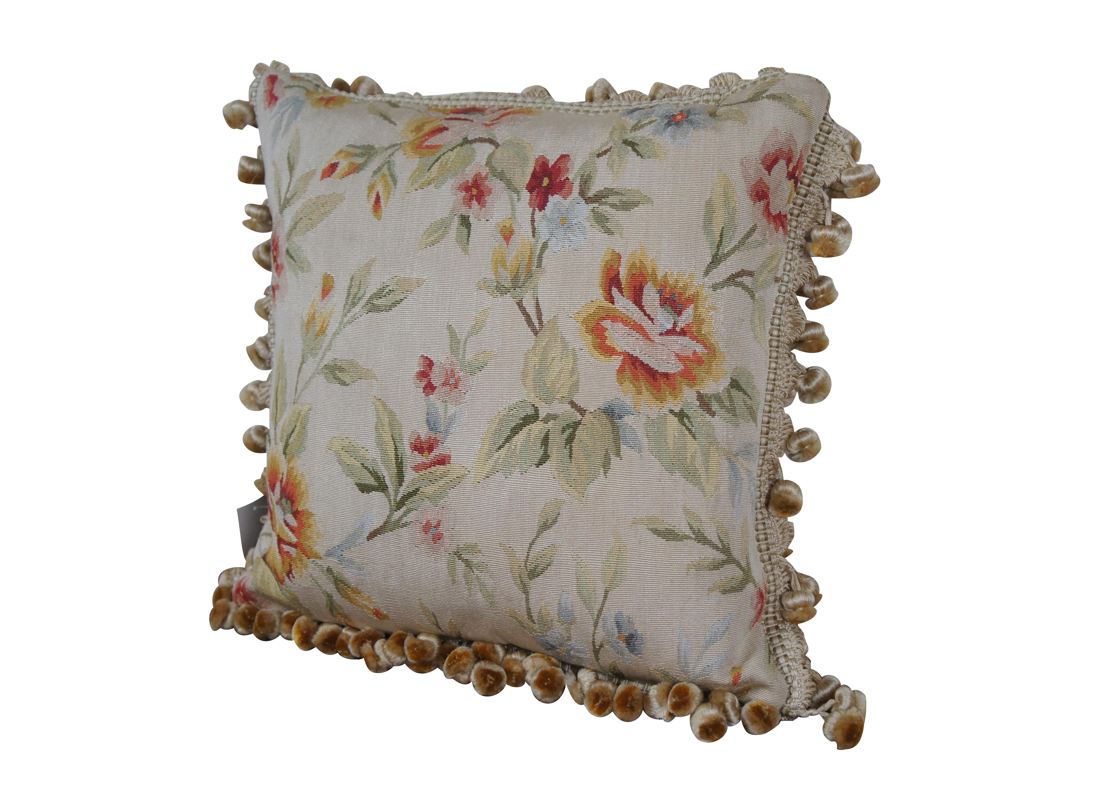 2 Available - 20th century square throw pillow, embroidered in silk with leafy branches of orange, red, and blue flowers. Cream ball tassel trim. Beige velour back with zipper closure. Made in China by Qingdao Lianxing Carpets.

Dimensions:
16