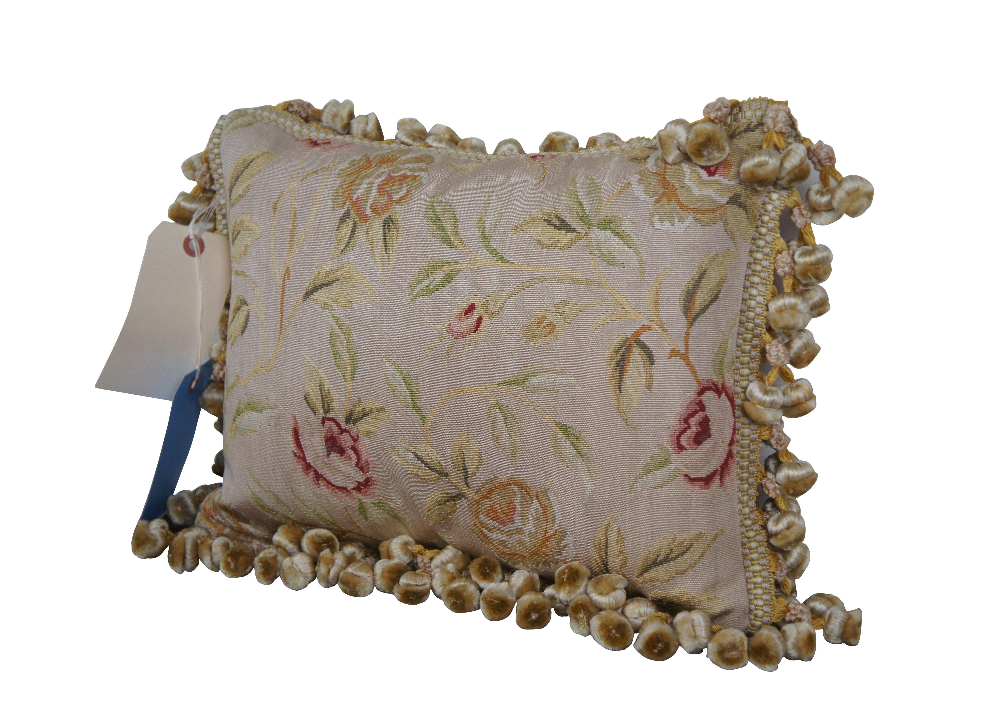 2 Available - 20th century square throw pillow, embroidered in silk with leafy stems of large yellow and pink roses. Cream and gold ball tassel trim. Light brown velour back with zipper closure.

Dimensions:
12