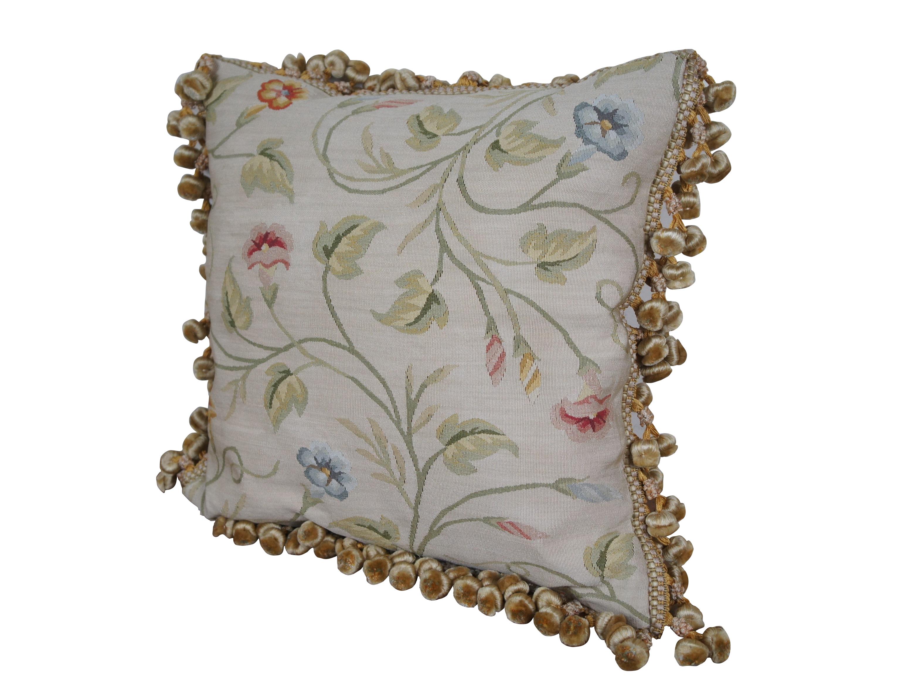 2 Available - 20th century square throw pillow, embroidered in silk with twisting green leafy stems sporting pink, blue, and orange morning glories. Cream and gold ball tassel trim. Beige velour back with zipper closure. Down filled.