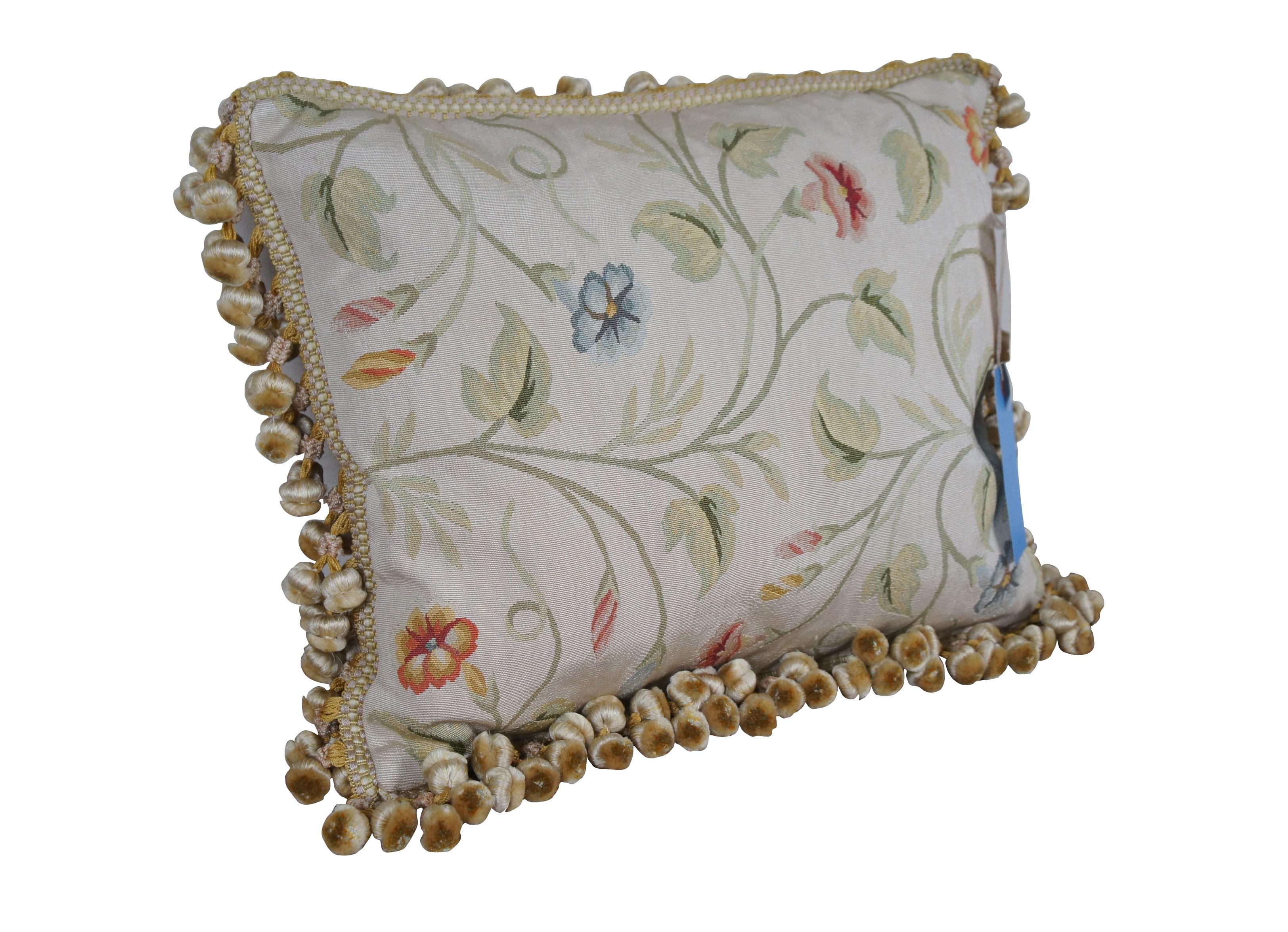 2 Available - 20th century rectangular lumbar / throw pillow, machine embroidered in silk with twisting green leafy stems sporting pink, blue, and orange morning glories. Cream and gold ball tassel trim. Beige velour back with zipper closure. Down