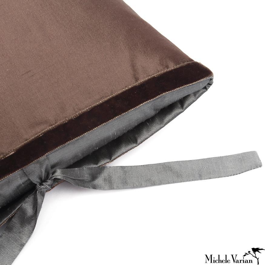 A luxury handmade decorative throw pillow made of natural silk dupioni great for using color to brighten up a contemporary living room, bedroom or lounge. Silk dupioni is a high quality, tightly woven, crisp silk with an iridescent effect. The