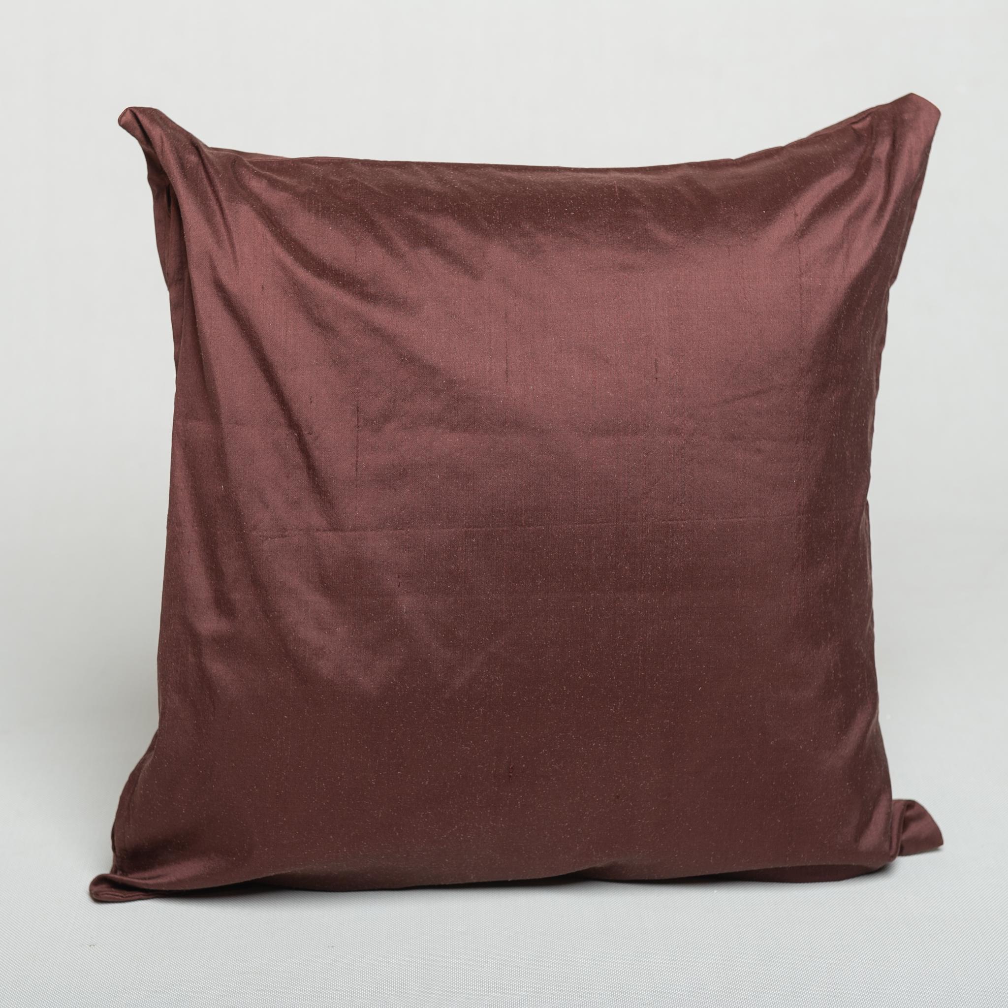 Brown silk cushion with hand embroidery in silk threads: modern or classic, but beautiful!.
(I forgot designer 's name..)