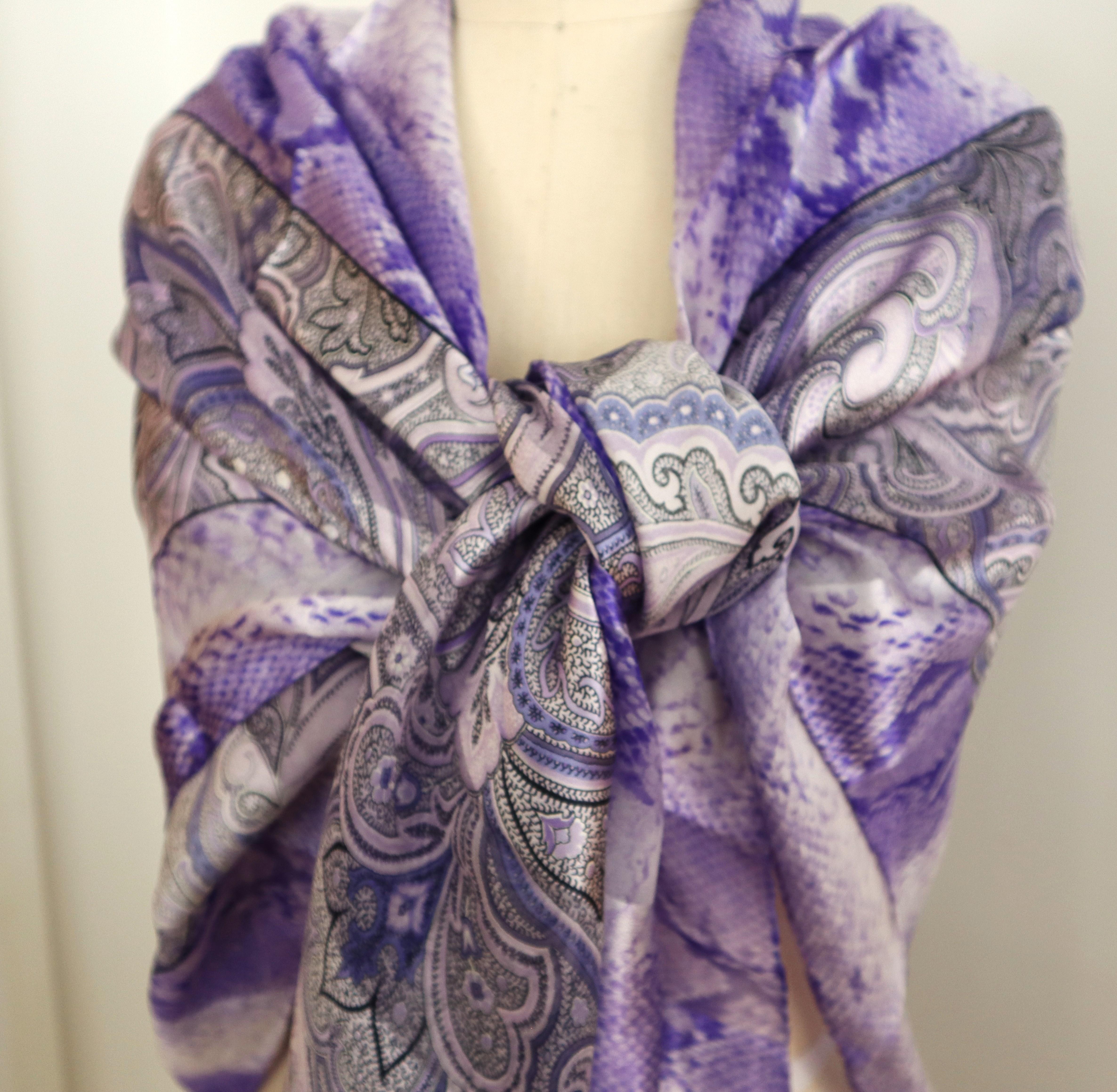 Silk Escada Scarf Purchased in the early 90s at Neiman Marcus. Paisley Snake Print. Purple tones. Stored away till now, never worn. Over sized. Measuring  55 x 53. We have more in other colors listed as well. This is out of a massive collection of