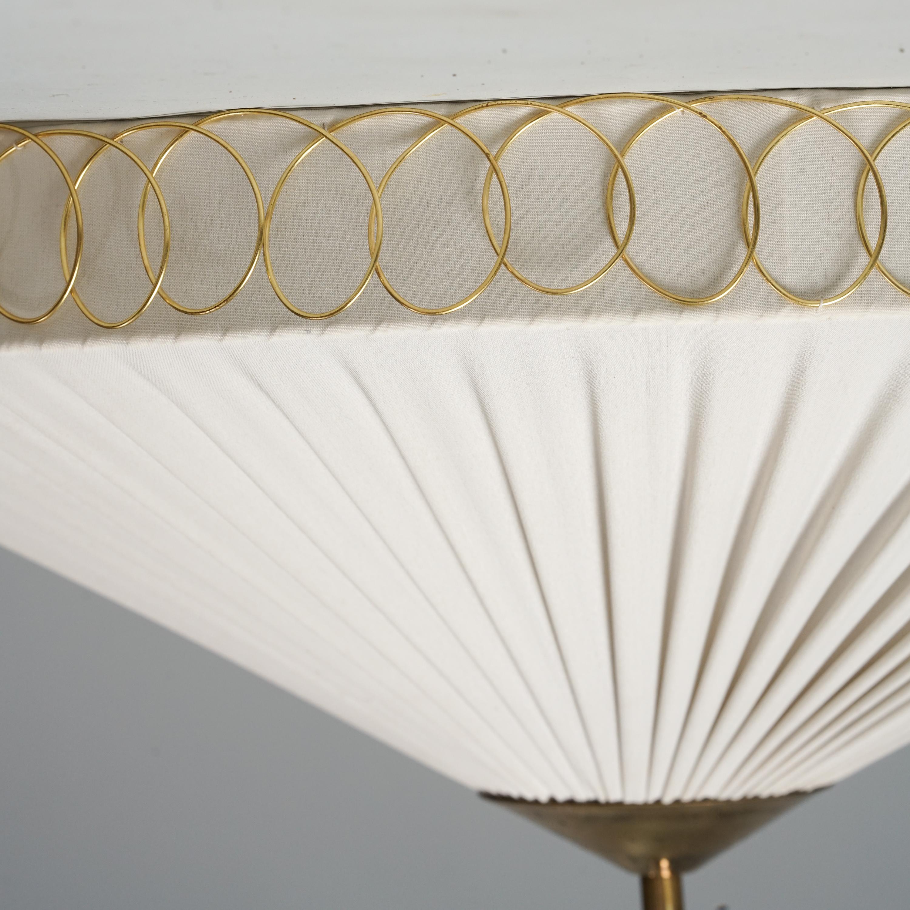 Gorgeous Scandinavian Modern flush mount, manufactured in Finland, 1950s. Silk lampshade with brass details. Good vintage condition, patina and minor wear consistent with age and use. 