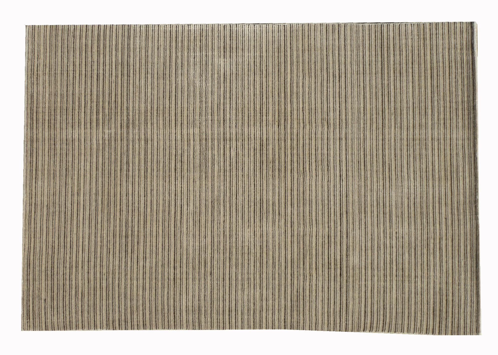 Handmade silk pile on a cotton foundation.

Dimensions: 4' x 5'11