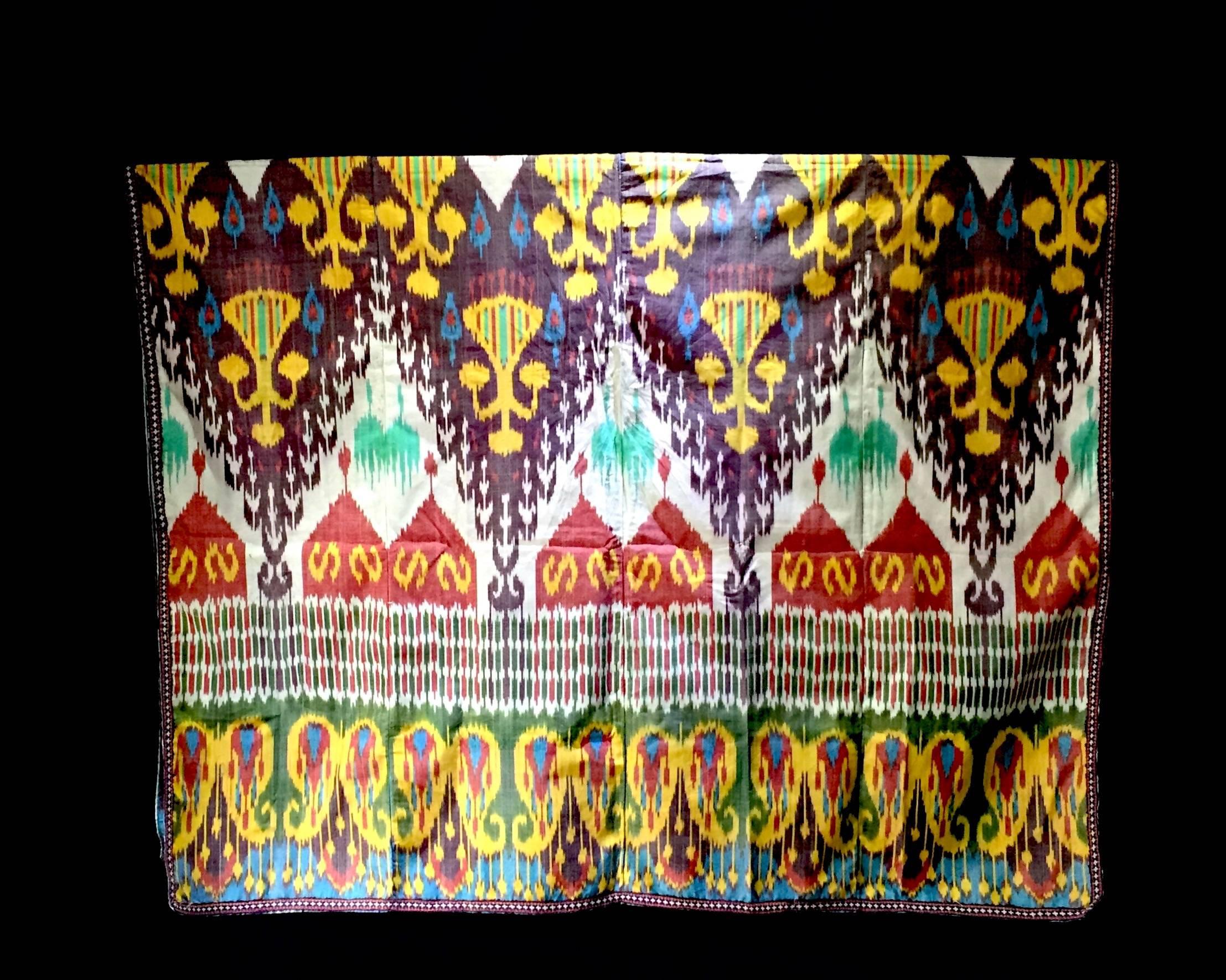 Beautiful silk Ikat embroidered Parda from Uzbekistan, an elaborate, colorful, and complicated pattern. A true conversation piece due to its rich history, circa early 20th century

Ikat weaving has emerged from different parts of the world