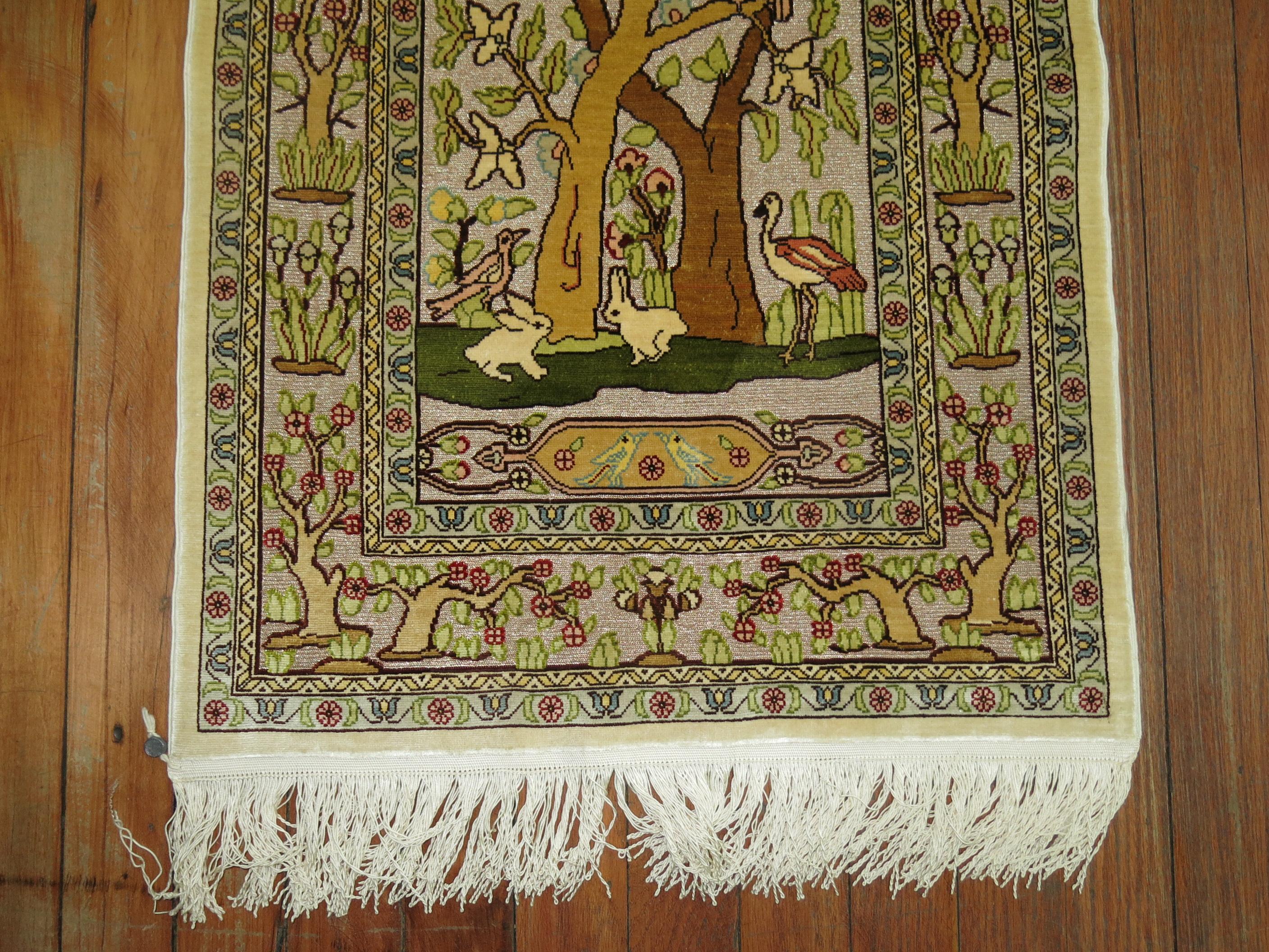 A late 20th century Turkish Herekeh silk and metallic pictorial Rug
In the mid-19th century, Sultan Abdul Majid proclaimed Hereke to be the royal weaving village. The small rugs were woven there were considered the finest in the world. All examples