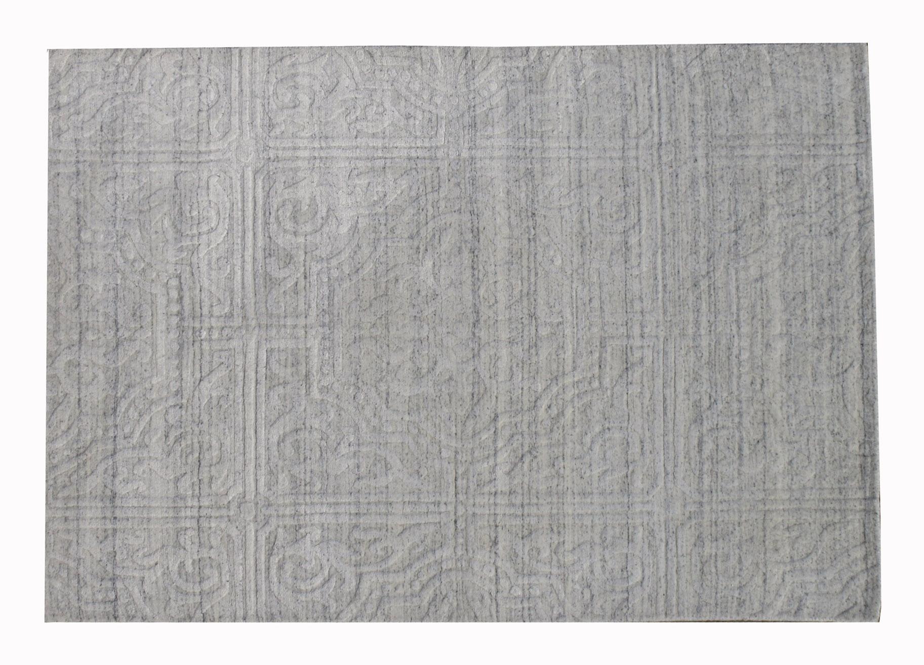 Handmade, high-low silk pile on a cotton foundation.

Modern trellis design.

Dimensions: 4' x 5'11