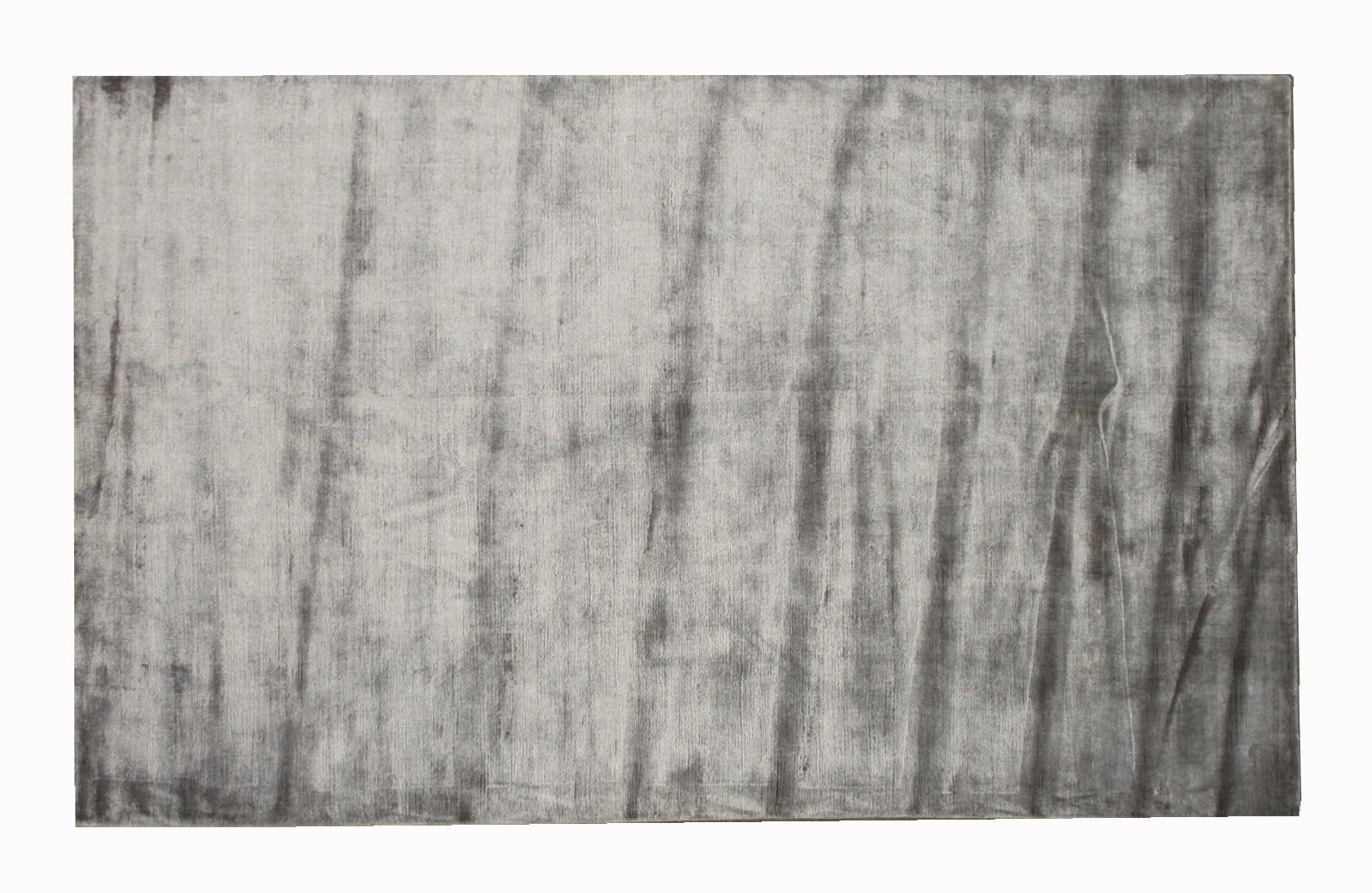 Handmade silk pile on a cotton foundation.

Dimensions: 5' x 8'1