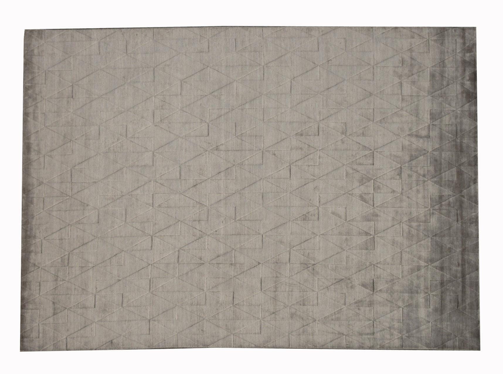 Handmade silk pile on a cotton foundation.

Dimensions: 8'2