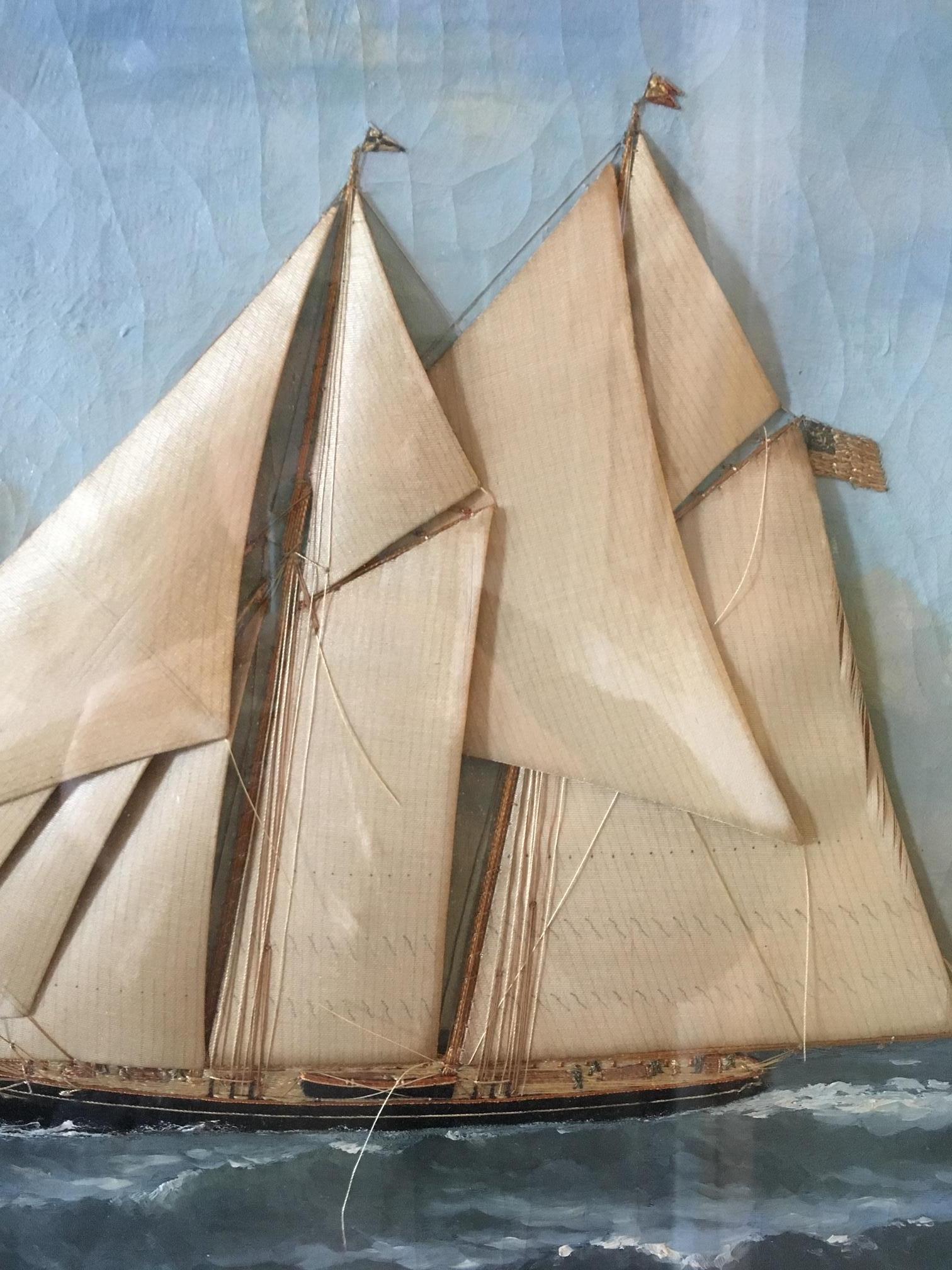 Silk mounted and embroidered portrait of a Schooner-Rigged Yacht, hand tied onto an oil on canvas Seascape, by Thomas Willis (Danish-American: circa 1850-1925), circa 1880, featuring a topsail schooner closed hauled on starboard tack under full
