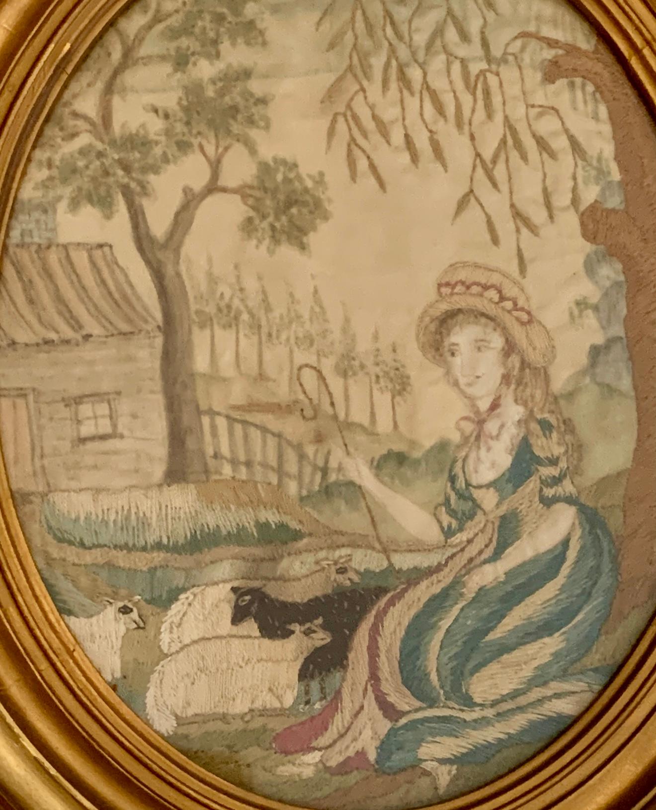 The shepherdess is lovely. She is seated near her flock under the shade of a leafy tree, wearing a green and white dress and a hat with red trim. Nearby we see a house with a fence.
The frame is later.
Dimensions: 12.75