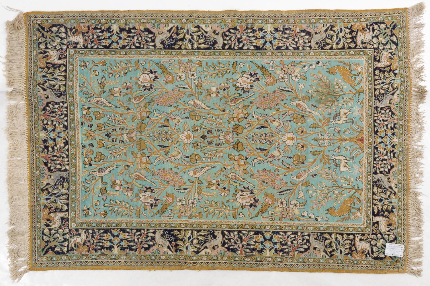 Elegant oriental silk carpet of an indefinable aquamarine color, on which flowers, birds and animals are represented, as it seems to be in the Garden of Paradise.
Perfect on wall.
With also a good price for closing activities.

nr. 665 -