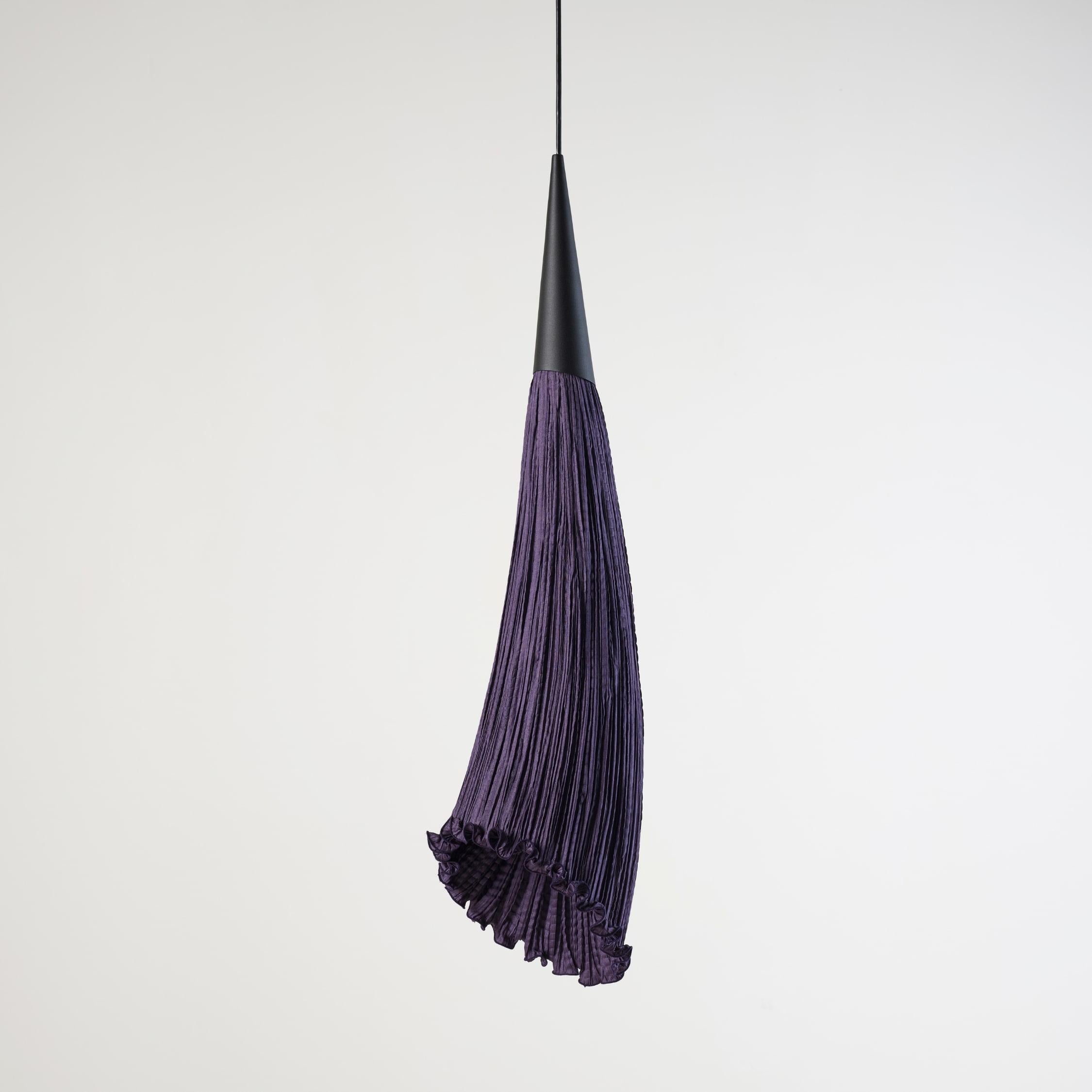 Suspended from a ceiling plate, Chilli can be installed as a solo signature feature, or hung in a dramatic cluster. Handmade from silk on metal.