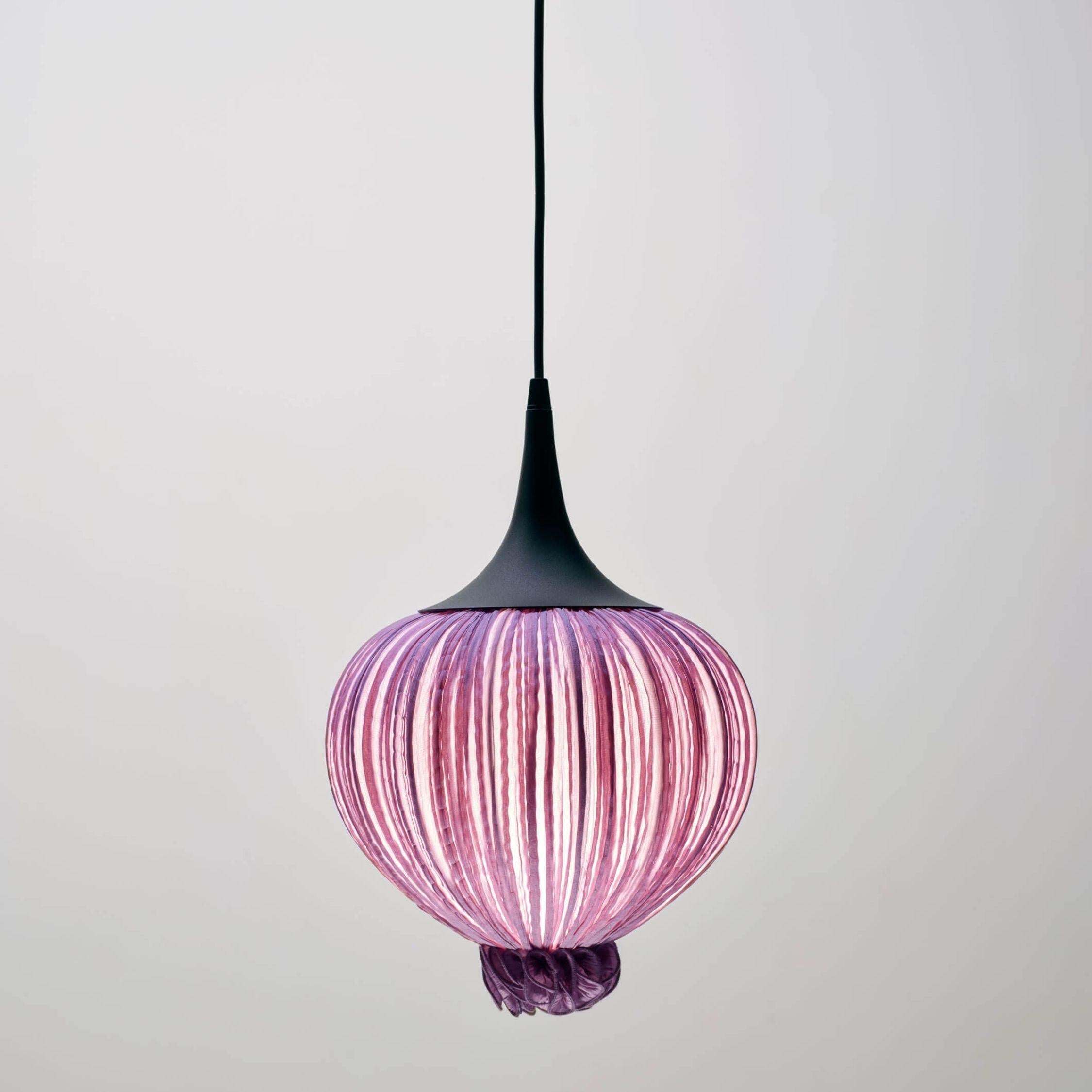 Urchin shaped pendant light hand made from crushed silk on metal.