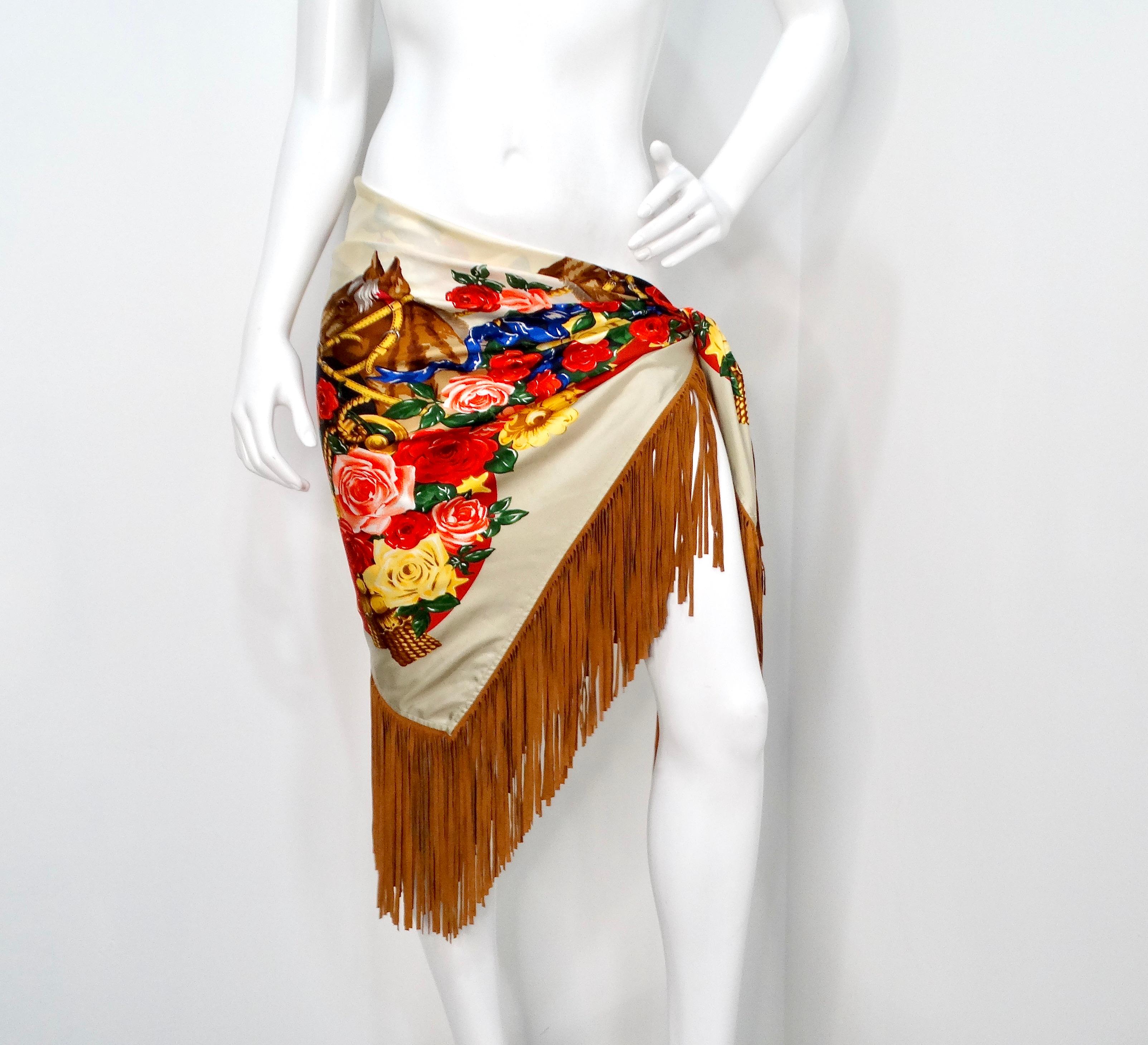 Introducing the exquisite Silk Printed Horse & Flowers Motif Fringe Scarf, a masterpiece that uniquely combines elegance and versatility. This stunning scarf features a champagne and cream base adorned with a vibrant horse and floral motif,