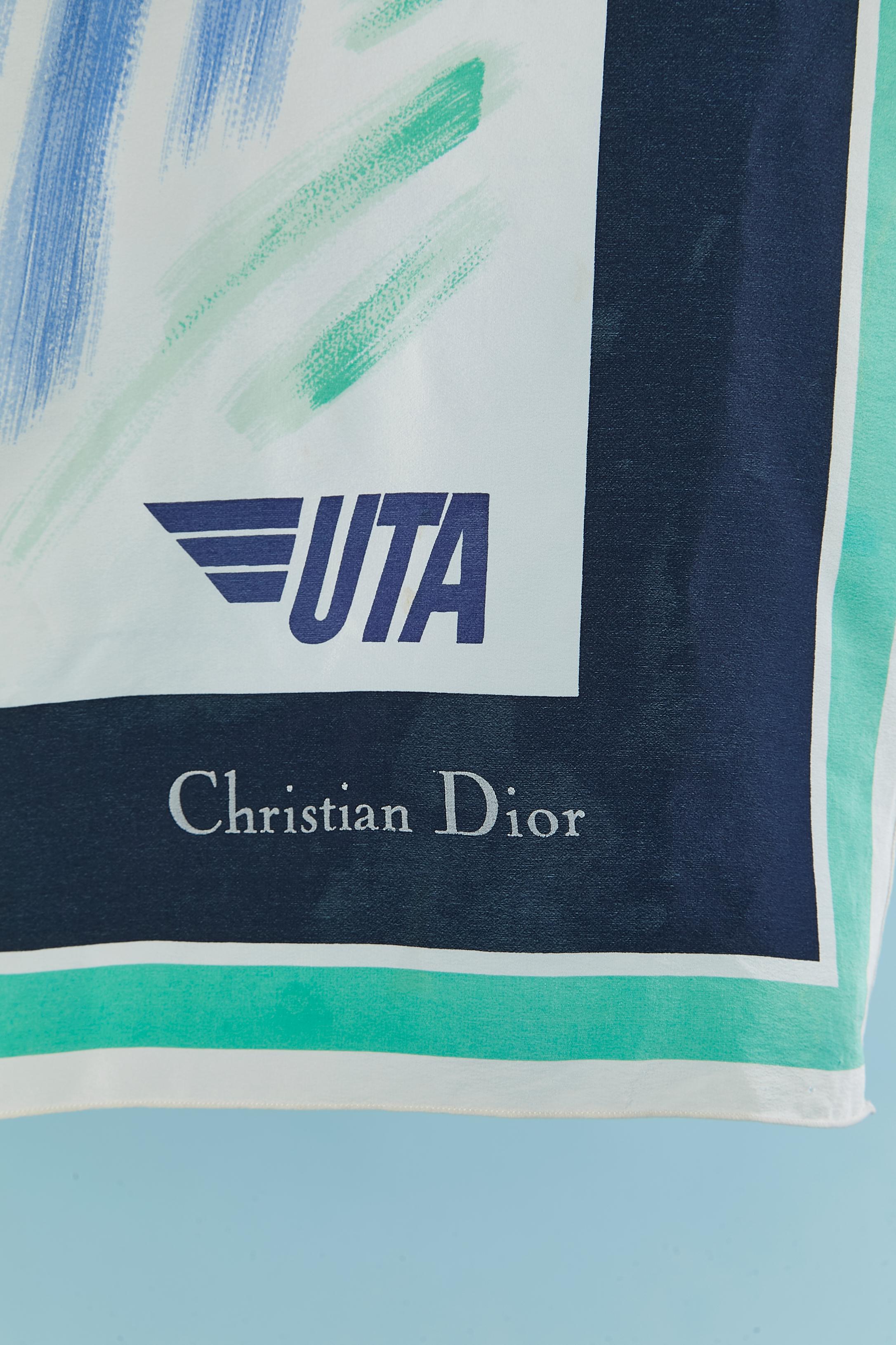 Silk printed scarf 
SIZE 114cm X 118cm 
 UTA ( Union de Transport Aerien) was a French airlines Cie which started in 1963 and closed in 1992. They did a collaboration with Dior in the 80's for the hostess uniform . 