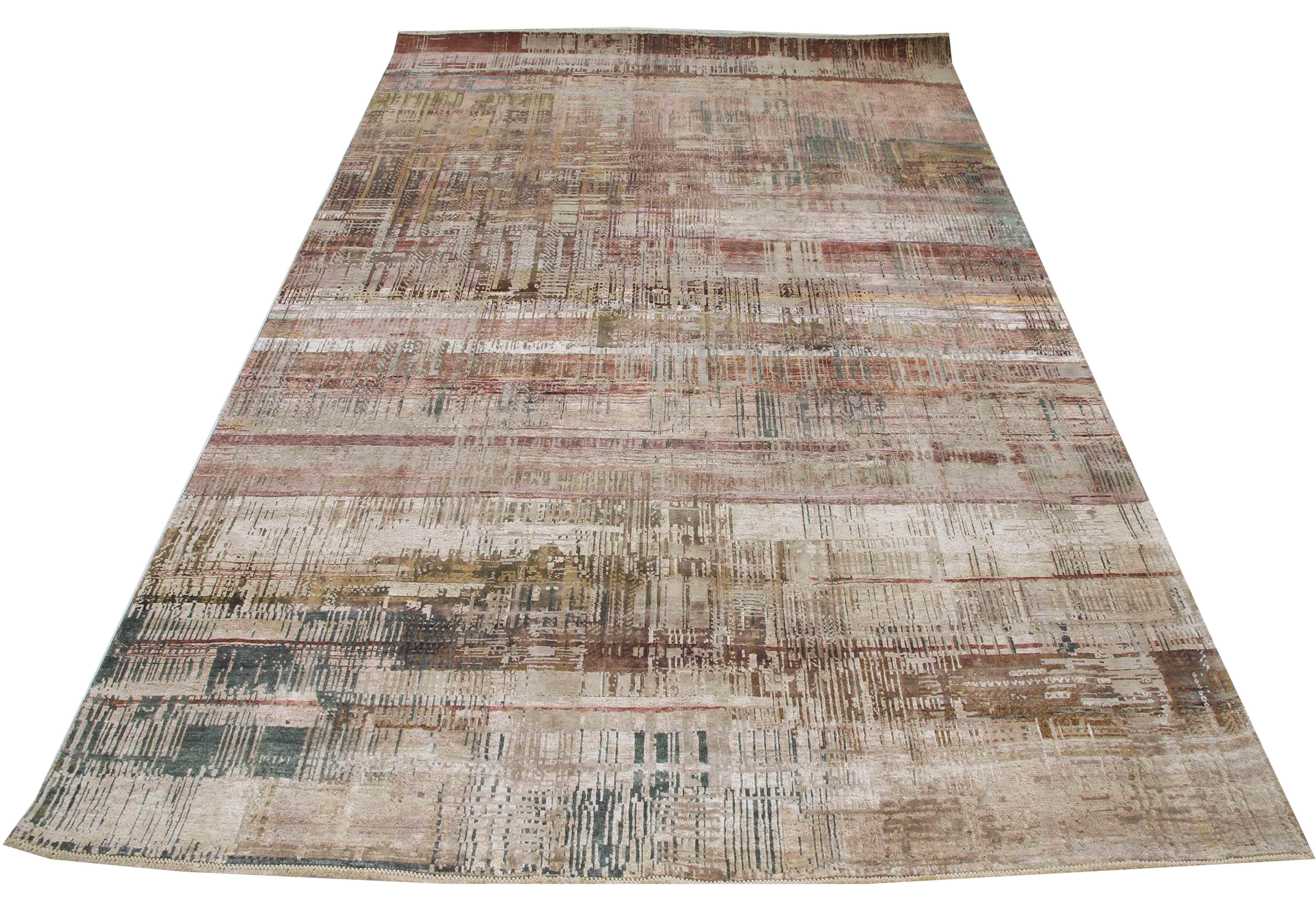With clean lines and a contemporary design, this rug brings characteristic elegance into your space. Woven from high-quality silk & wool yarns; this rug features a textile-inspired design that does not break the artistic flow of the rug.