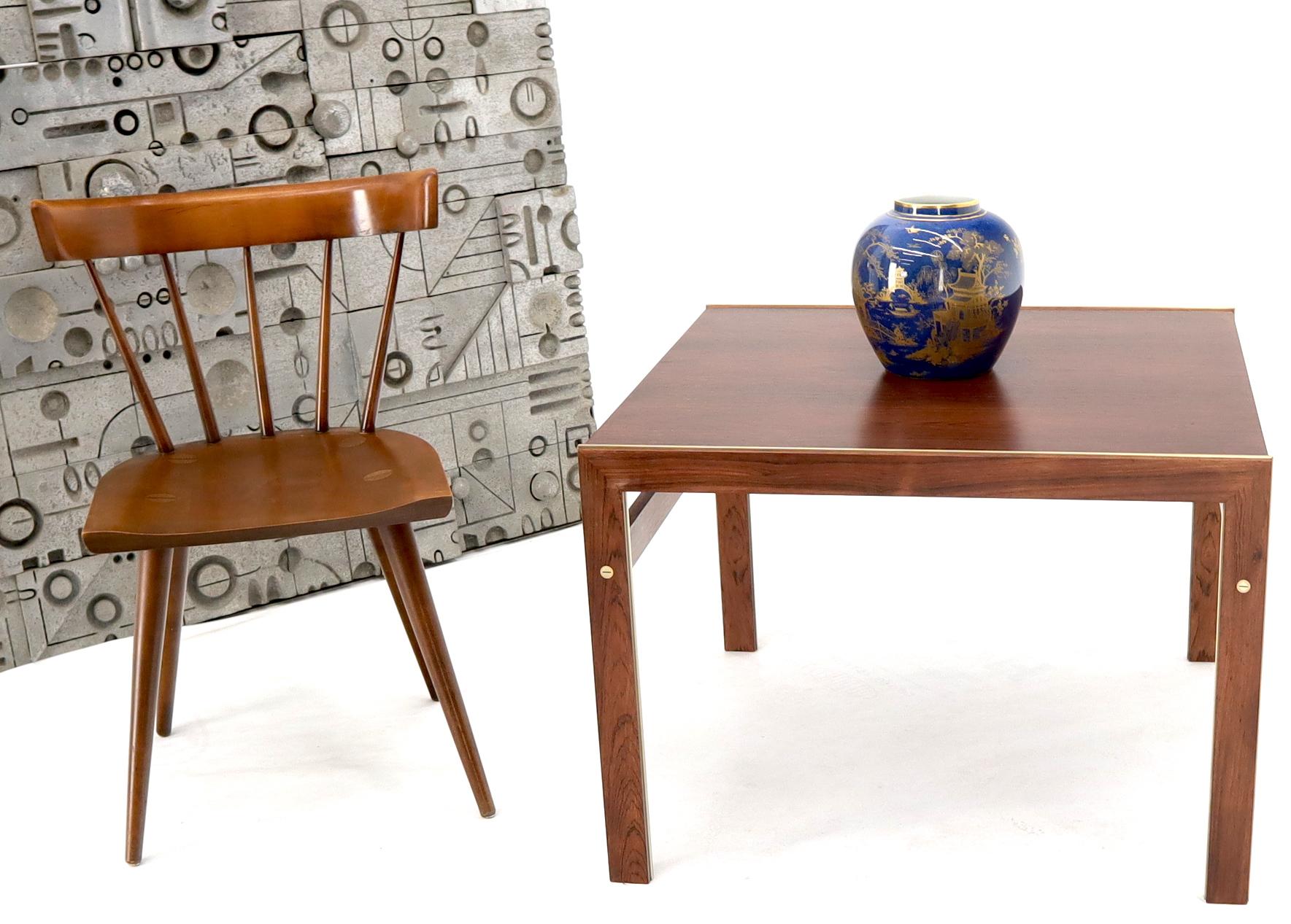 Midcentury Danish modern square rosewood occasional side end center table.
Beautiful condition with beautiful brass inlay parts.